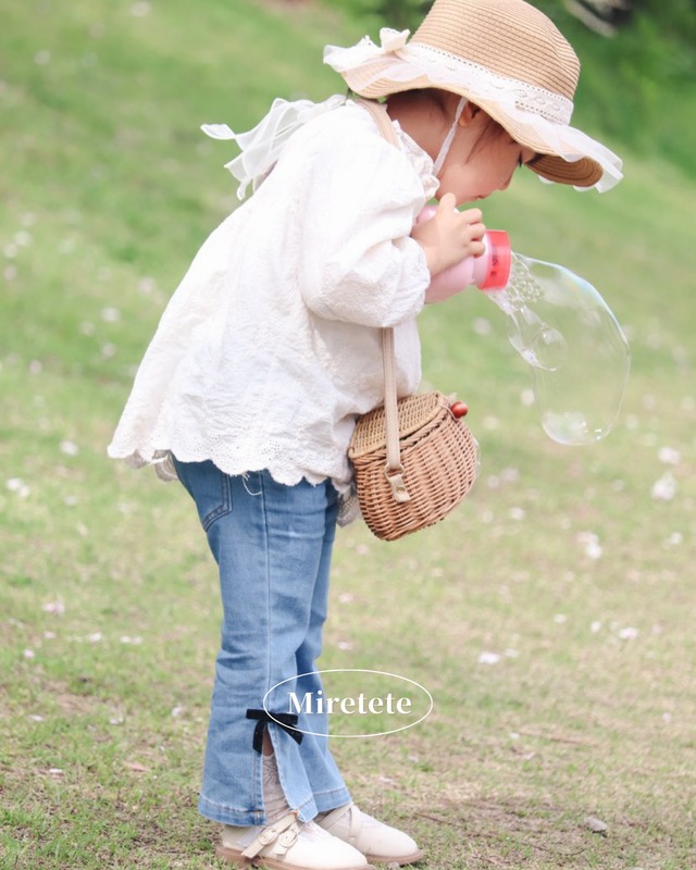 【取寄】ちょっぴりガーリーなスリット入りサイドリボンデニムパンツ