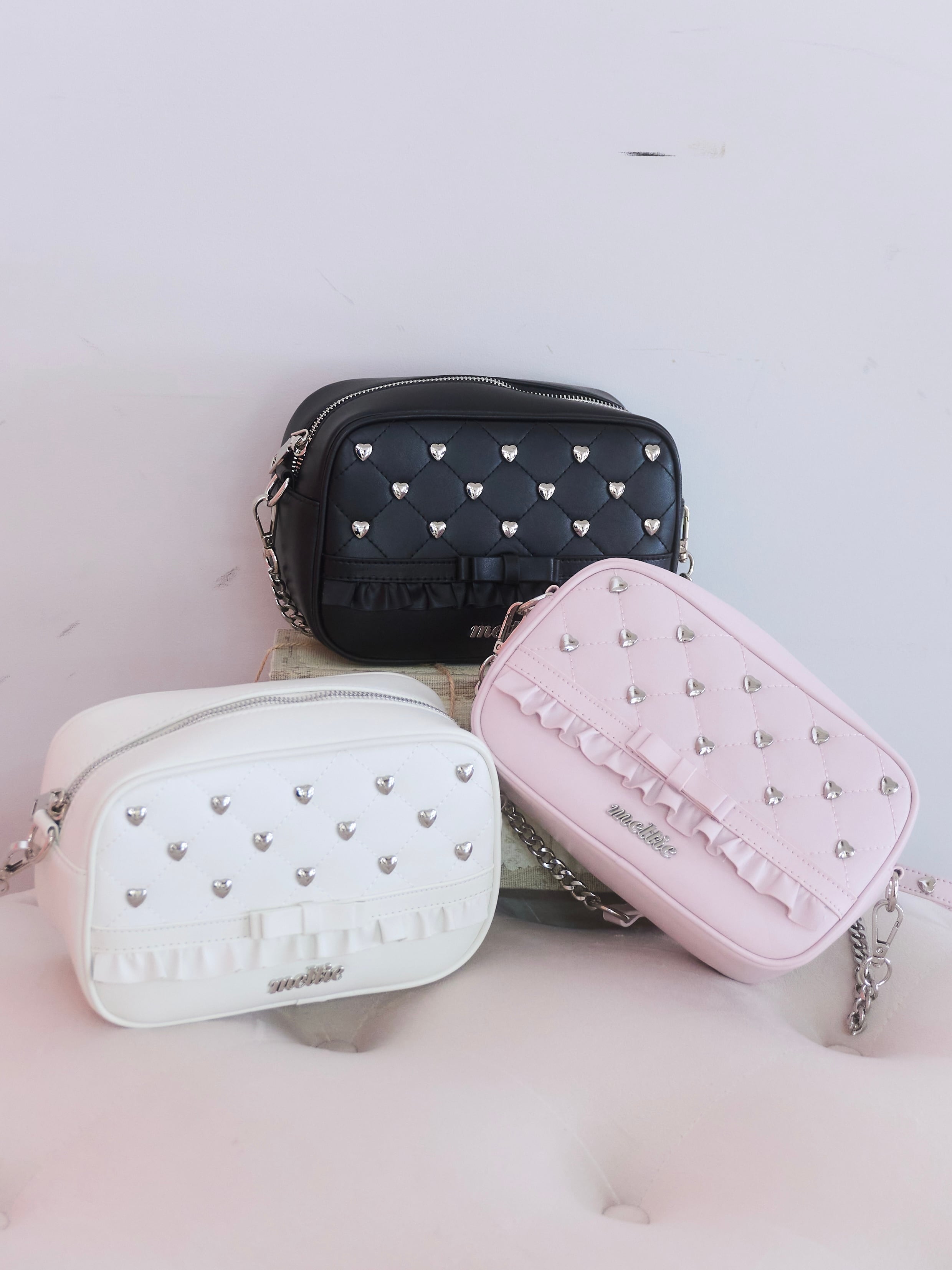 heart studs leather bag