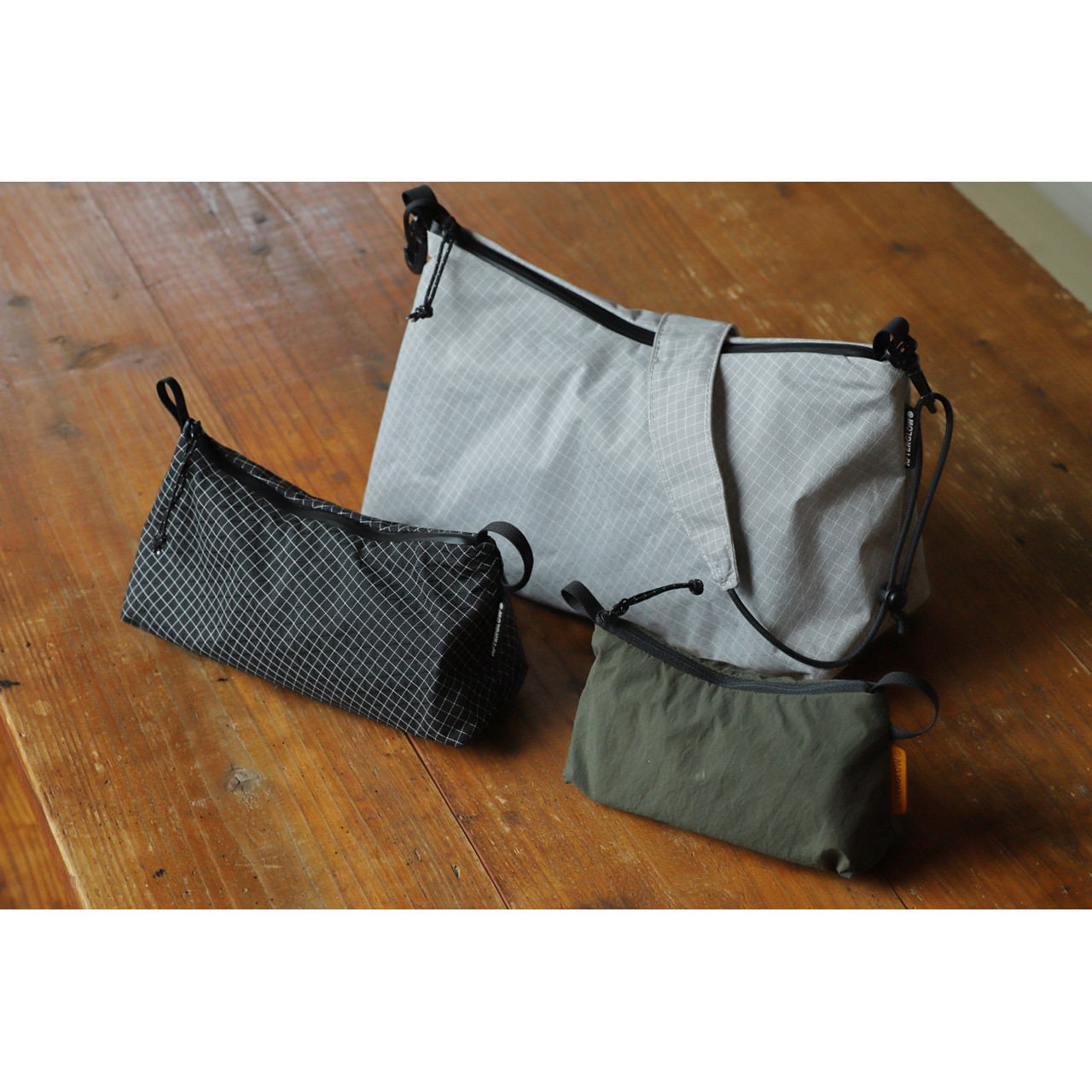 COL POUCH MEDIUM KONBU / コルポーチ 中 （コンブ） | Afterglow