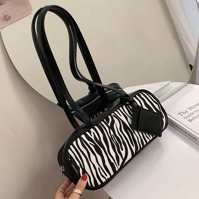 レディースバッグの感覚2020新しい流行のファッションワイルドワンショルダーアンダーアームバッグネットレッドニッチデザインハンドバッグ Tiancai_Wing_Bag83498240661