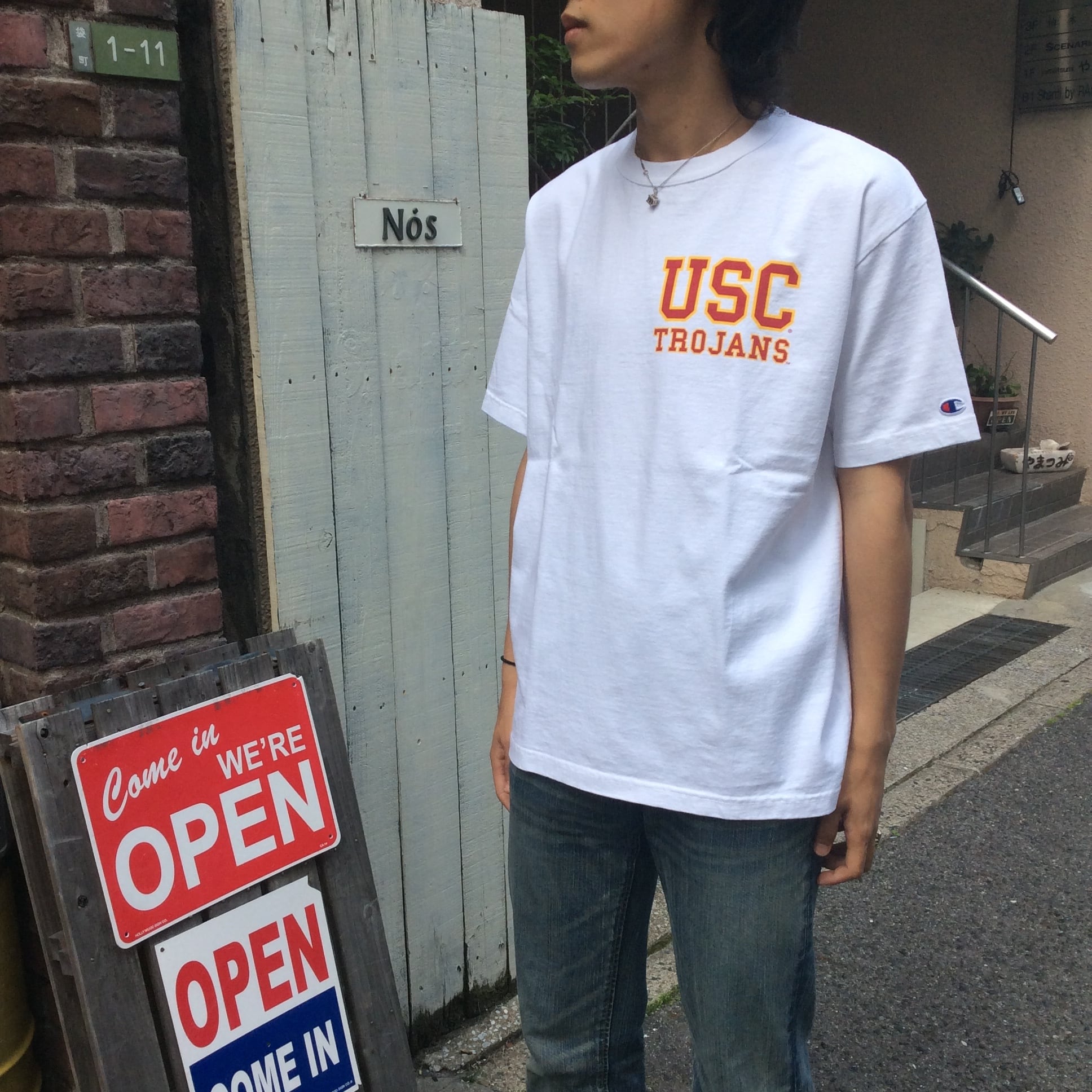 STUSSY ステューシー Tシャツ サイズ:XL Champion チャンピオン ウォッシュ加工 ワールドツアー クルーネック 半袖 Tシャツ オフホワイト 白 トップス カットソー コラボ【メンズ】