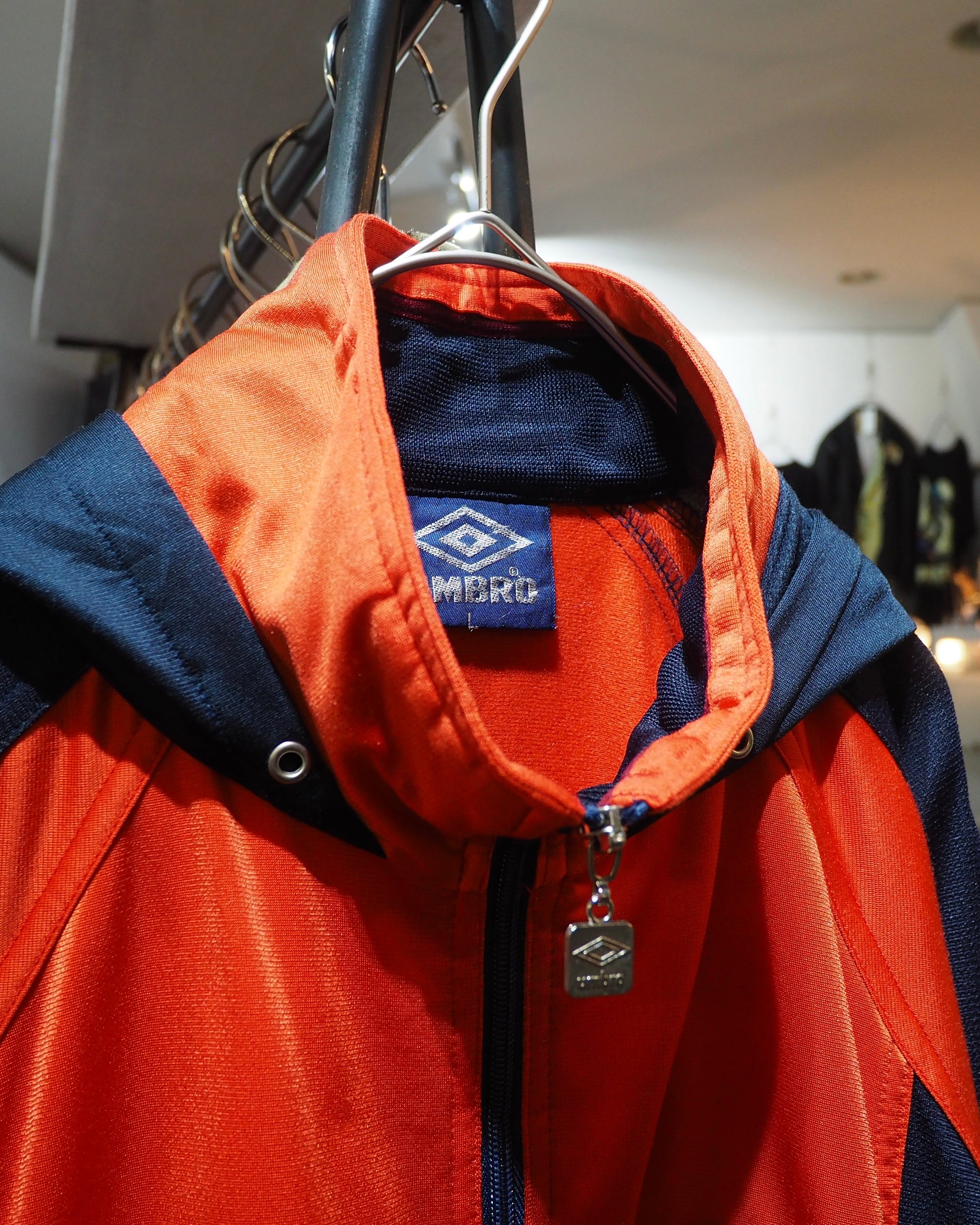 1990s " UMBRO " Vivid Orange × Dark Navy Switching Panel Vintage Loose Track Jacket