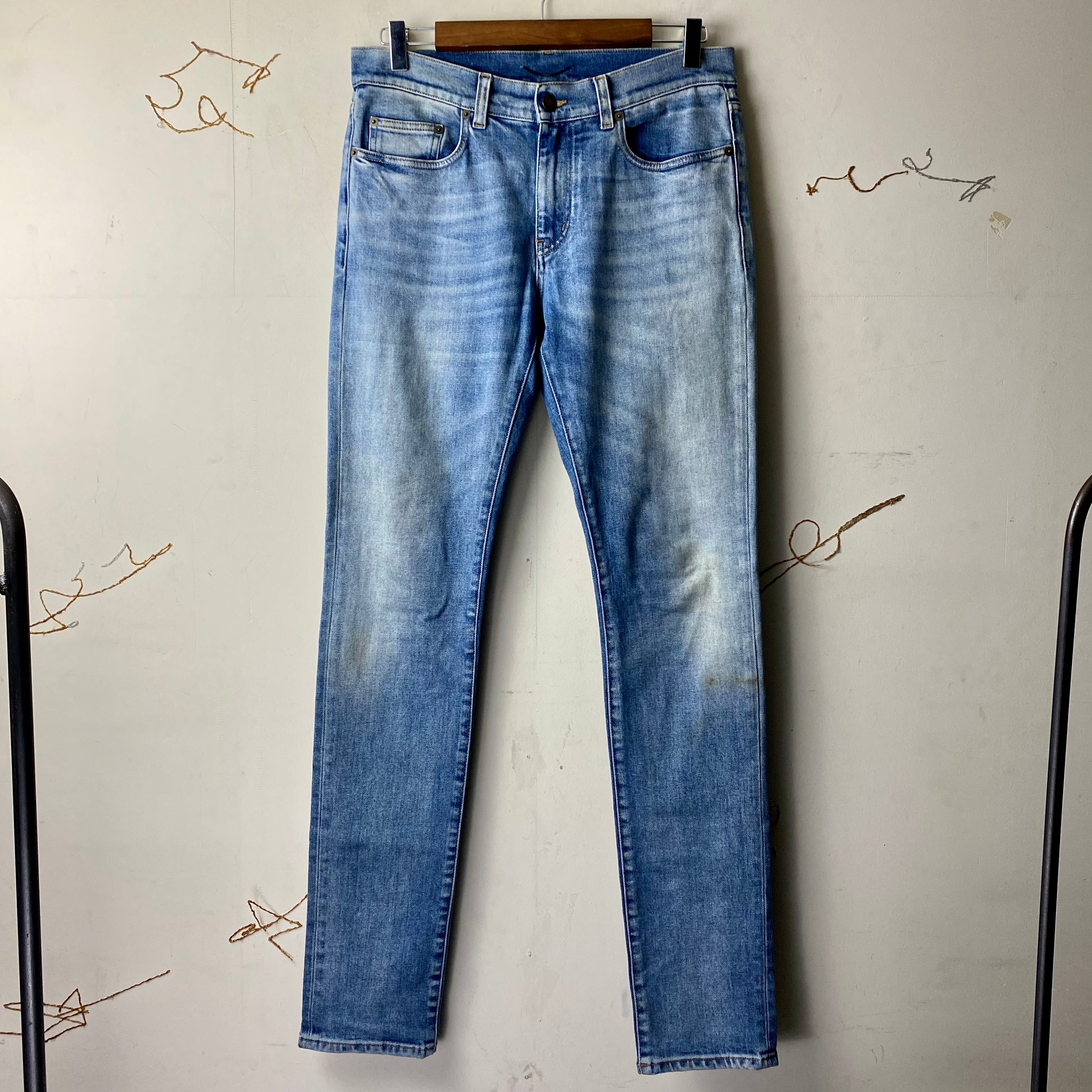 SAINT LAURENT PARIS faded denim skinny pants | NOIR ONLINE
