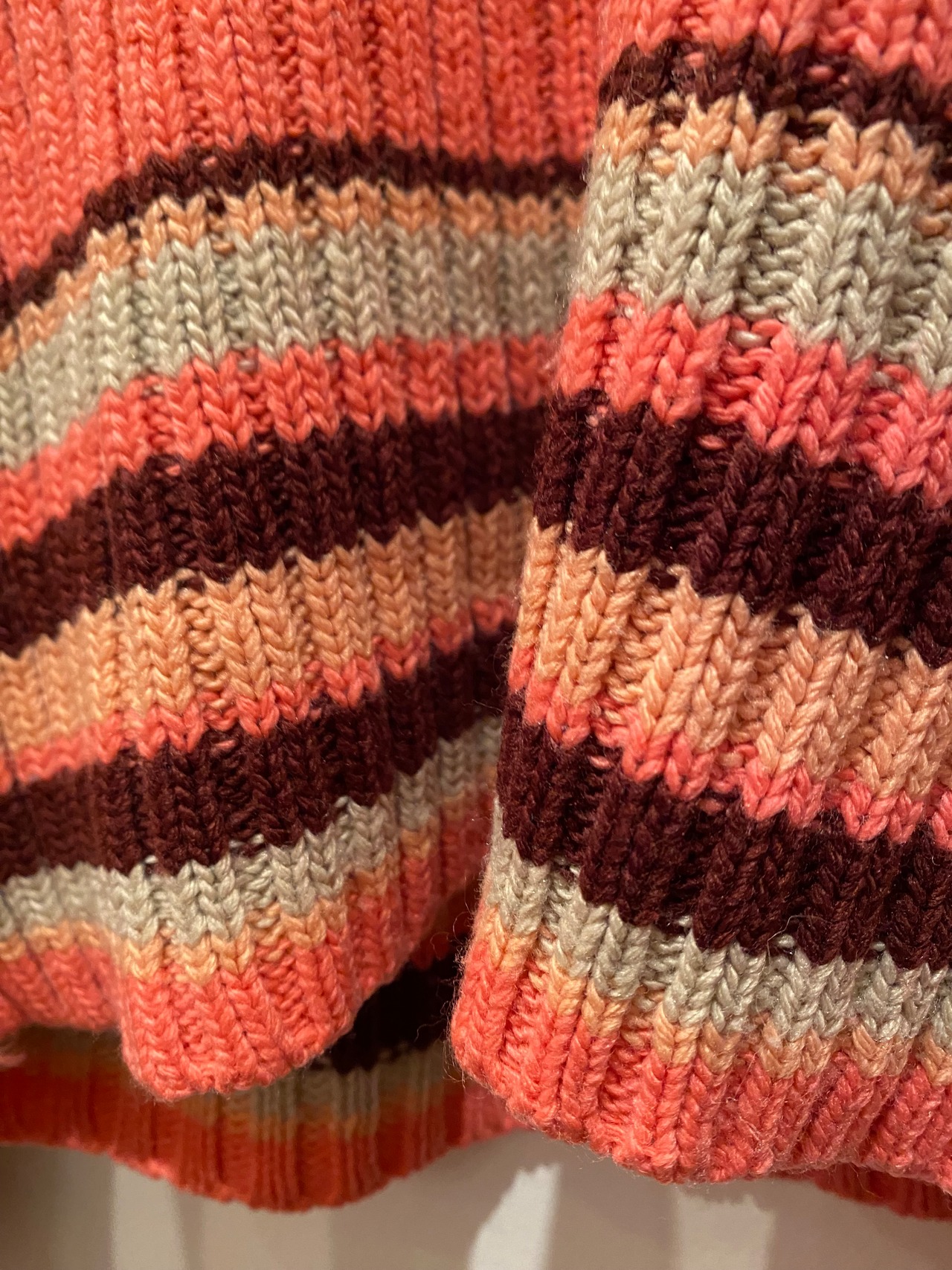 Border design turtleneck knit top