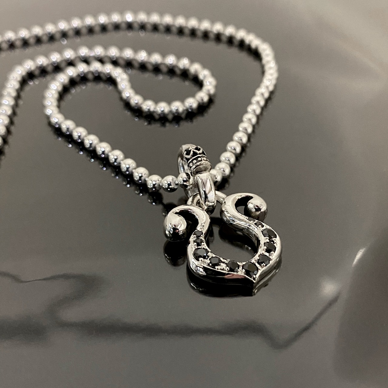 RHYTHMIC HORSESHOE with CUBIC ZIRCONIA PENDANT / リズミックホースシュー・キュービックジルコニアペンダント
