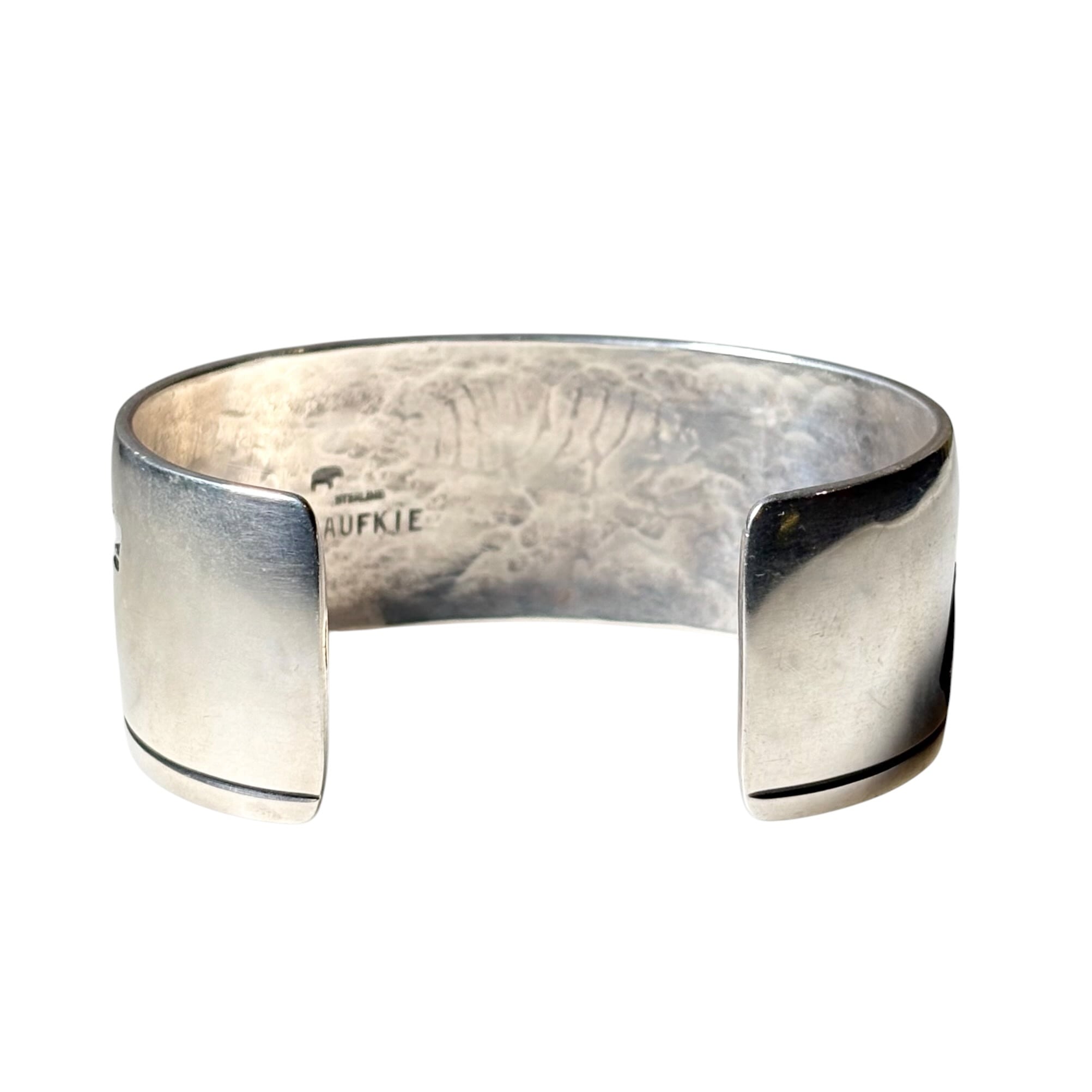 Hopi Lawrence Saufkie silver overlay bangle “walking bear” | NOIR