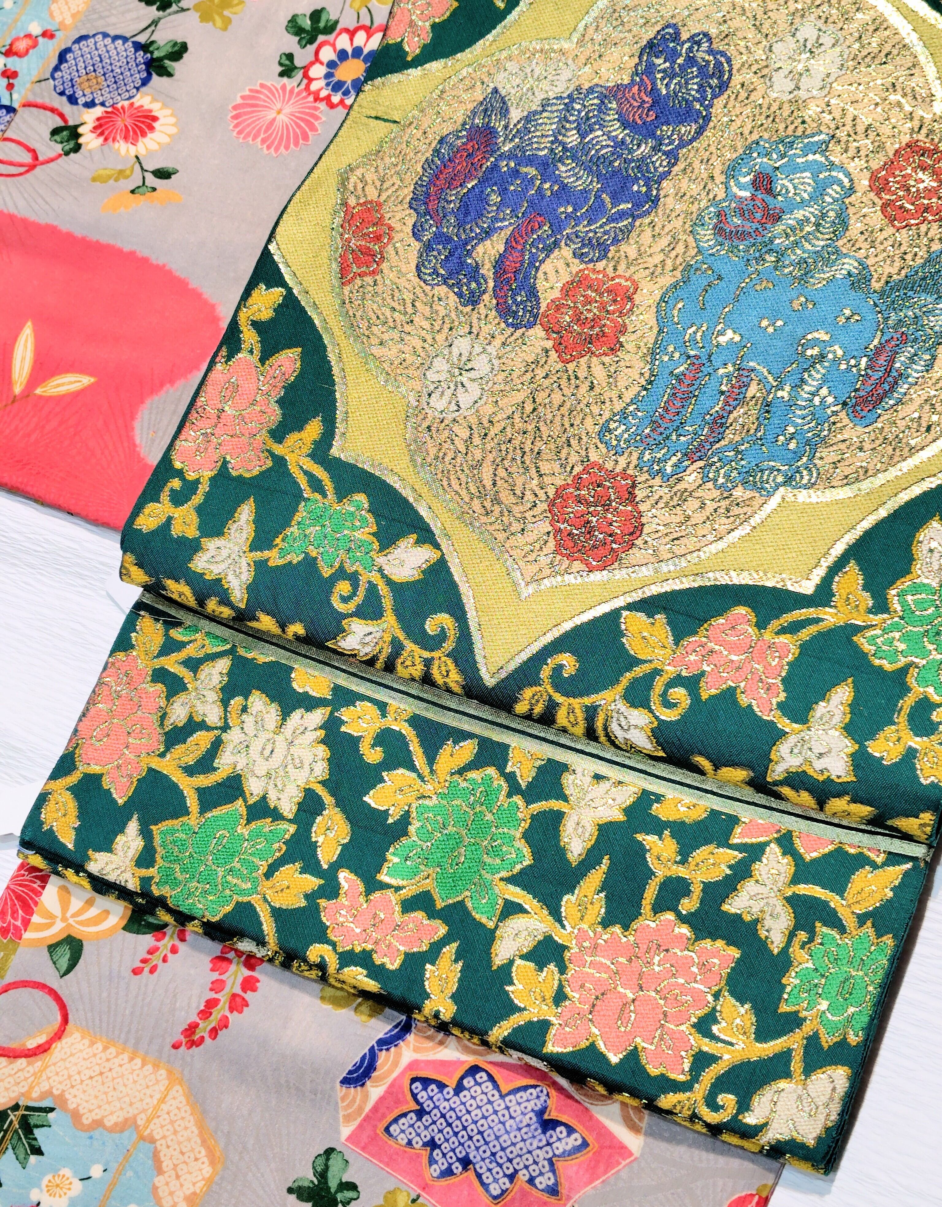 唐獅子柄のアンティークの袋帯〜緑青色に金糸 紺とシアン色の獅子