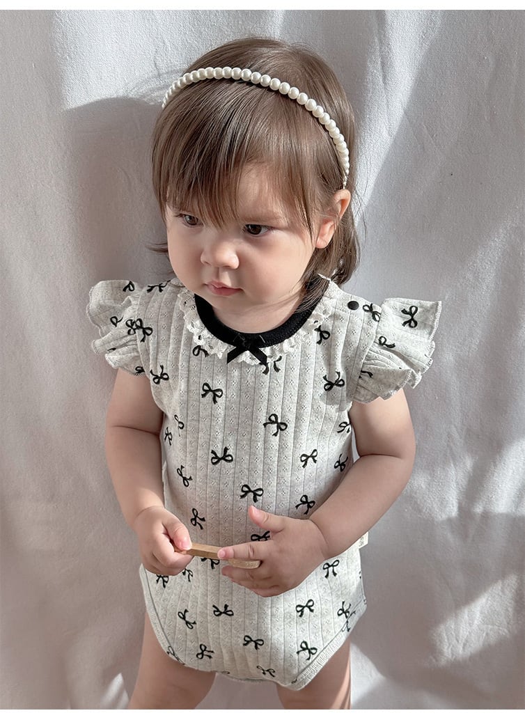 モノトーンリボンロンパース