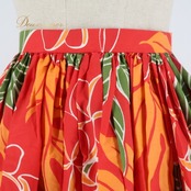 フラダンス 衣装 スカート レッド系 シングル プルメリア柄 ラウアエ柄 かわいい 華やか 鮮やか 明るい カラフル ふわふわ ひらひら 赤 橙 緑 ハワイアン アロハ ハワイアンプリント フラ ダンス レッスン 練習 オレンジ系 パーティー レディース