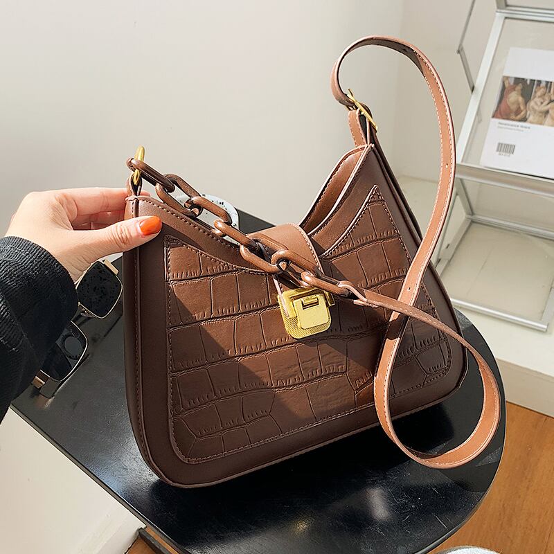 香港スタイルのレトロなスモールバッグ2020秋と冬の新しい流行のファッションシンプルなメッセンジャーバッグネットレッドテクスチャシングルショルダー脇の下バッグ Tiancai_Wing_Bag95320647867