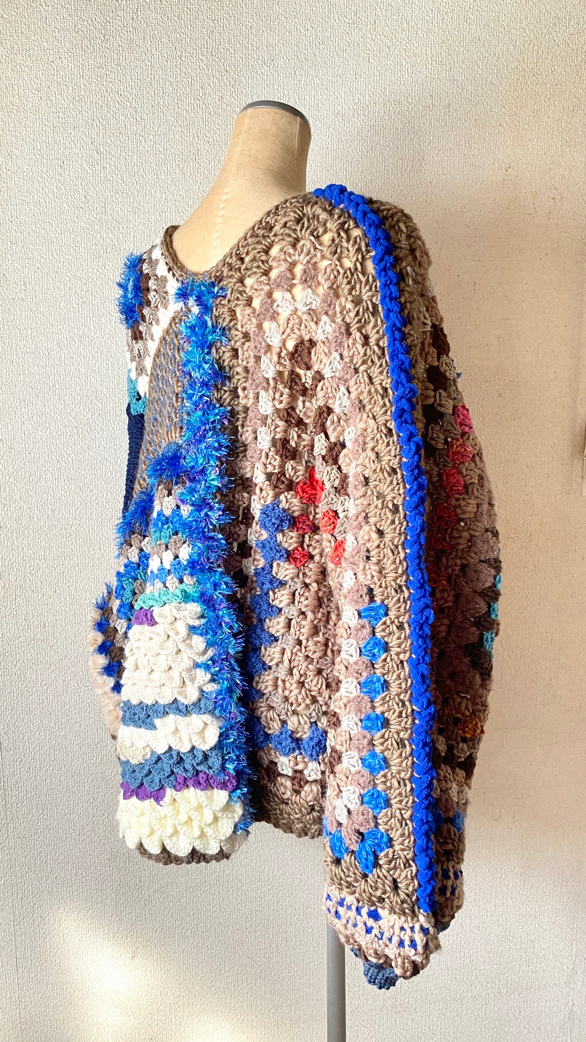 Crocheted granny hexagon and square motif asymmetrical cardigan