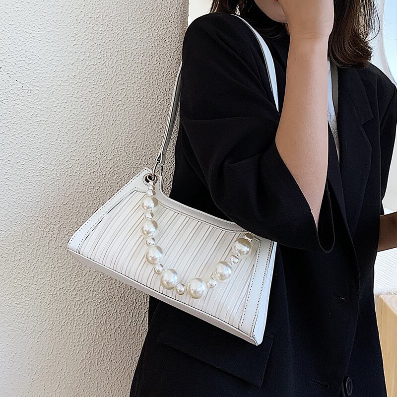 ネットレッドフェアリースモールバッグ2020ニューウェーブファッションシンプルパールショルダーバッグサマーエインワイルド脇の下バッグ Tiancai_Wing_Bag6796390