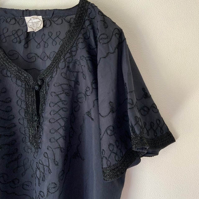 cutting brown blouse