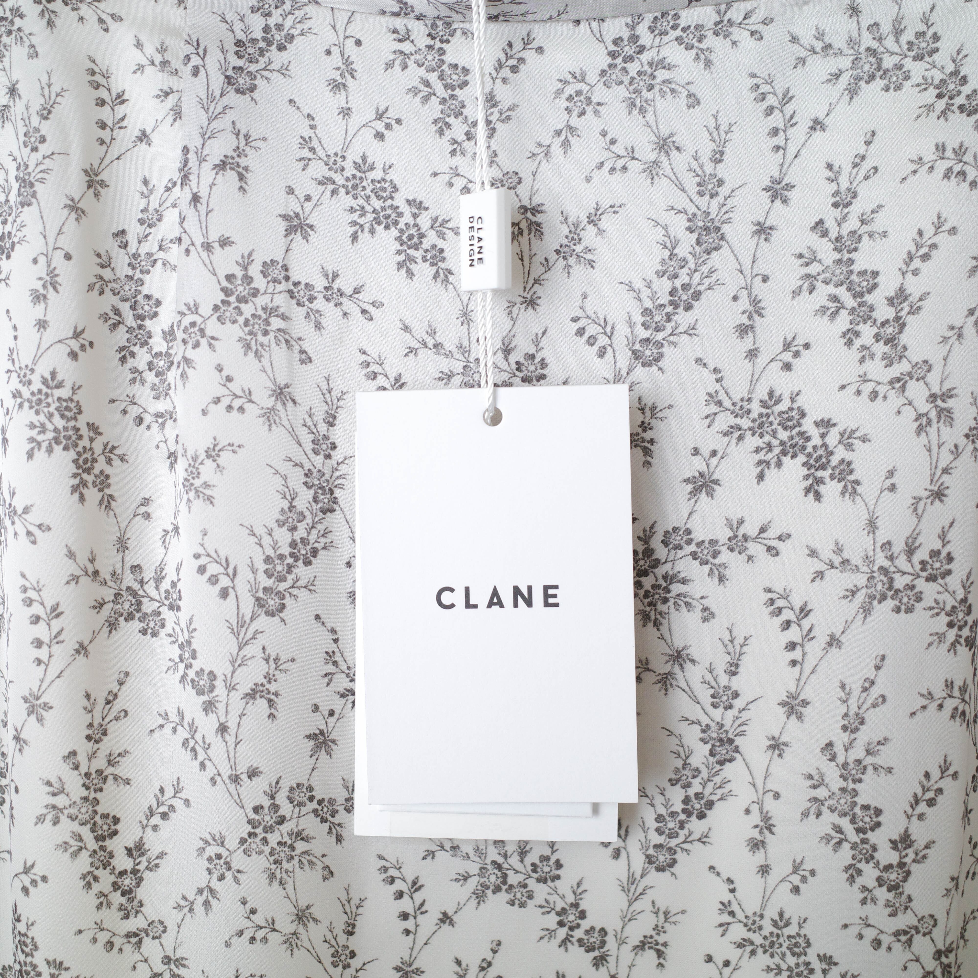 [NEW] CLANE	FLOWER FRILL SKIRT 16109-6001 WHITE