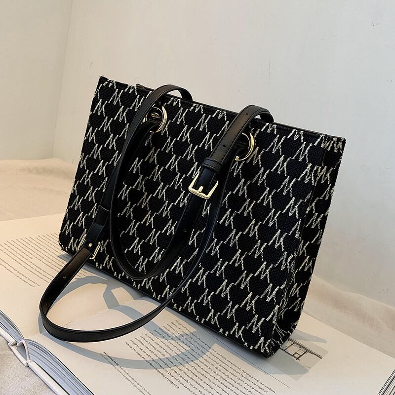 シンプルで大容量のバッグ、レディースバッグ、2020年秋冬の新しい流行のファッションカジュアルショルダーバッグ、ネットレッドのオールマッチトートバッグ Tiancai_Wing_Bag30846205617