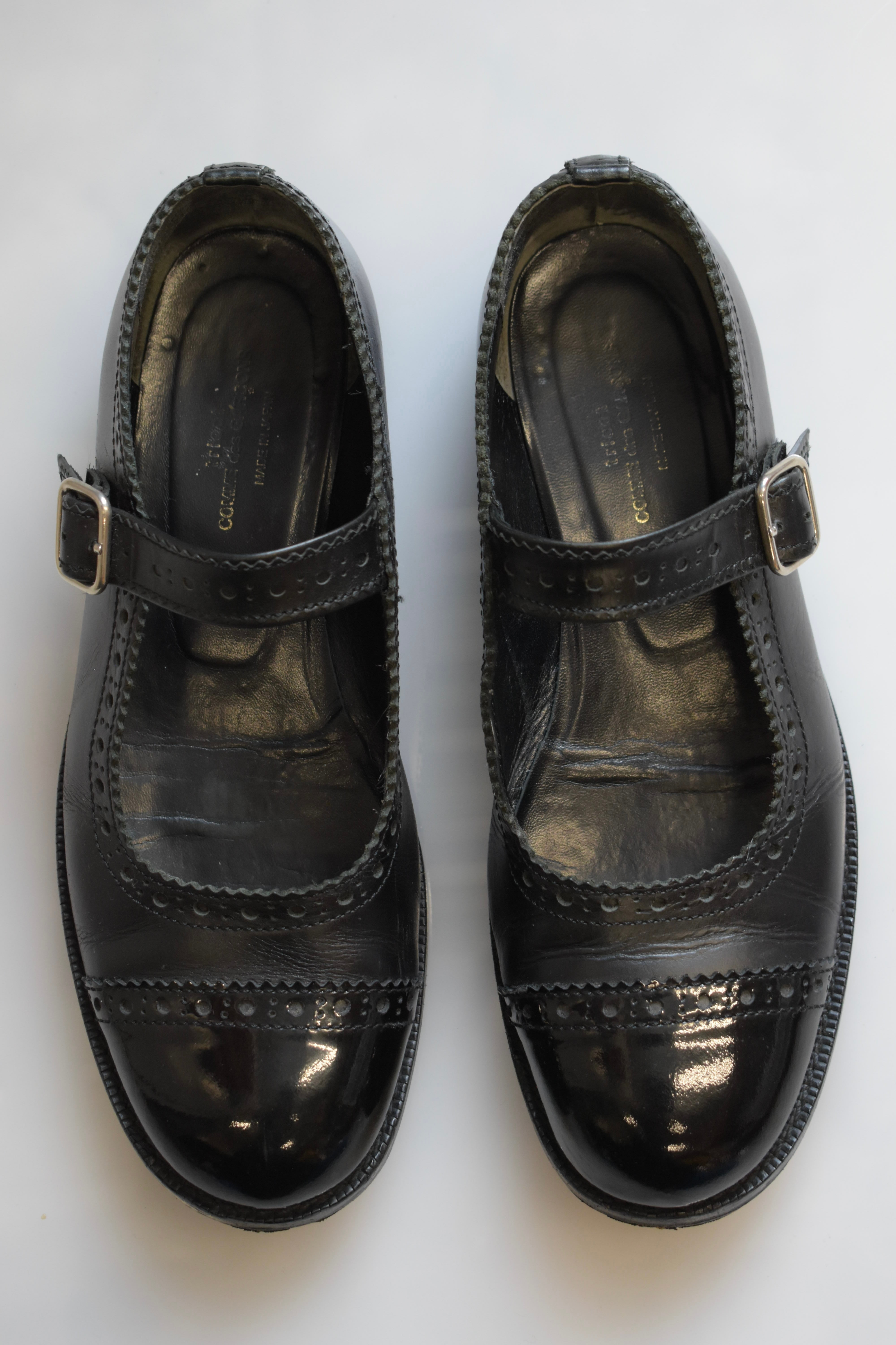 Black leather Mary Janes