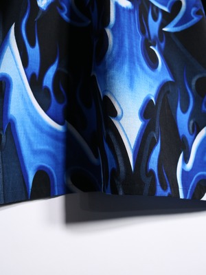 tribal motif skull fire pattern over silhouette s/s shirt