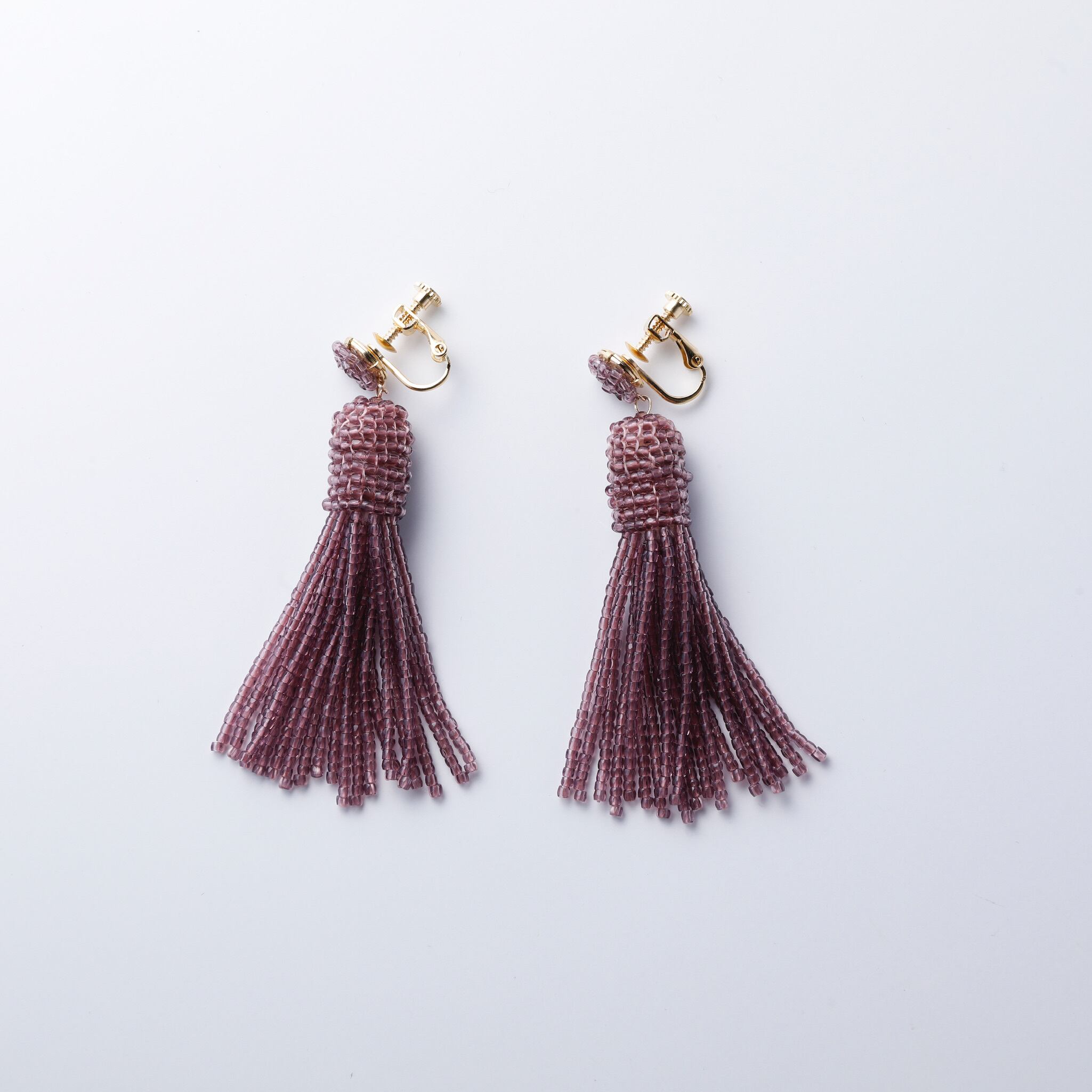 18KYGピアス パープルショートタッセル