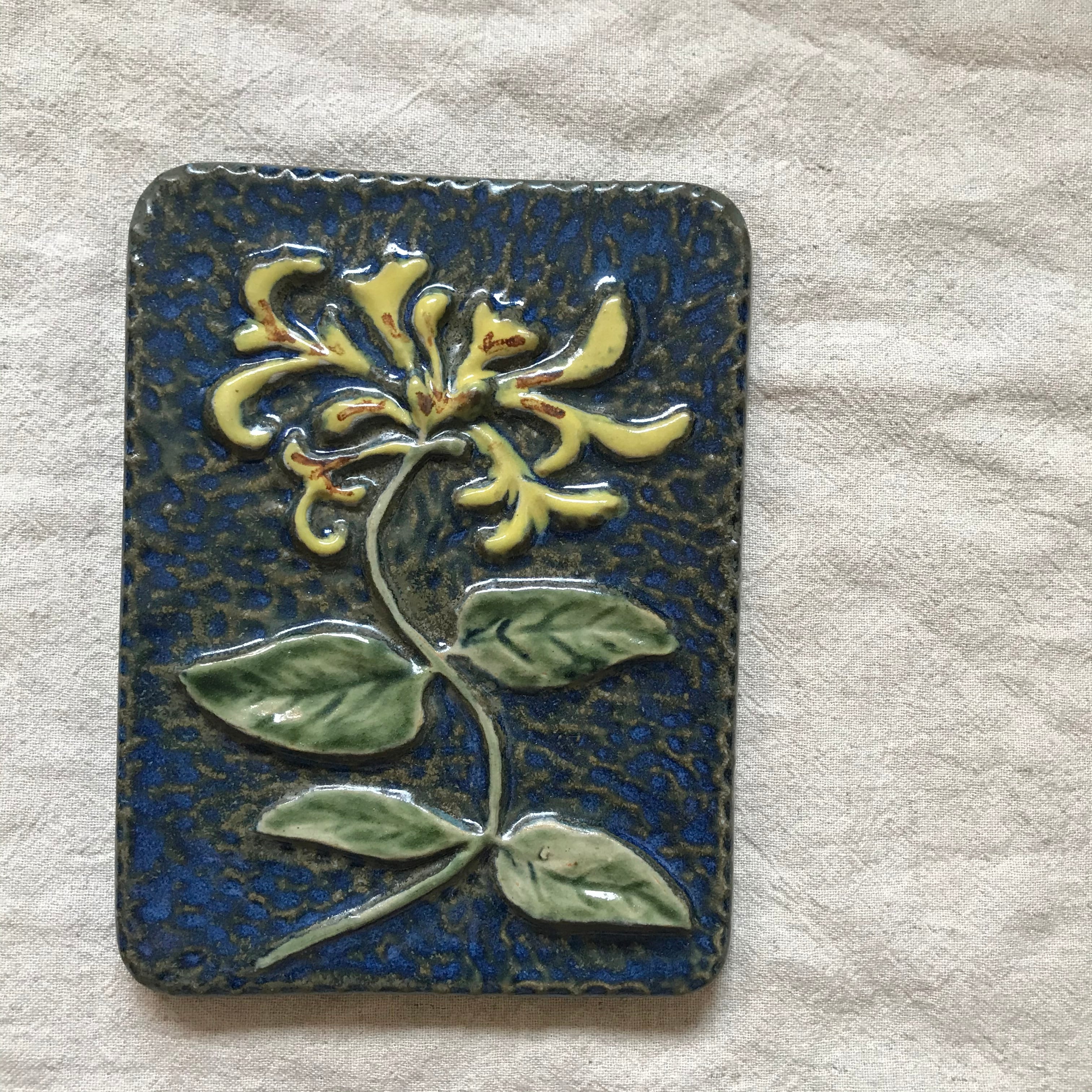 EGO stengodsの黄色い花の陶板