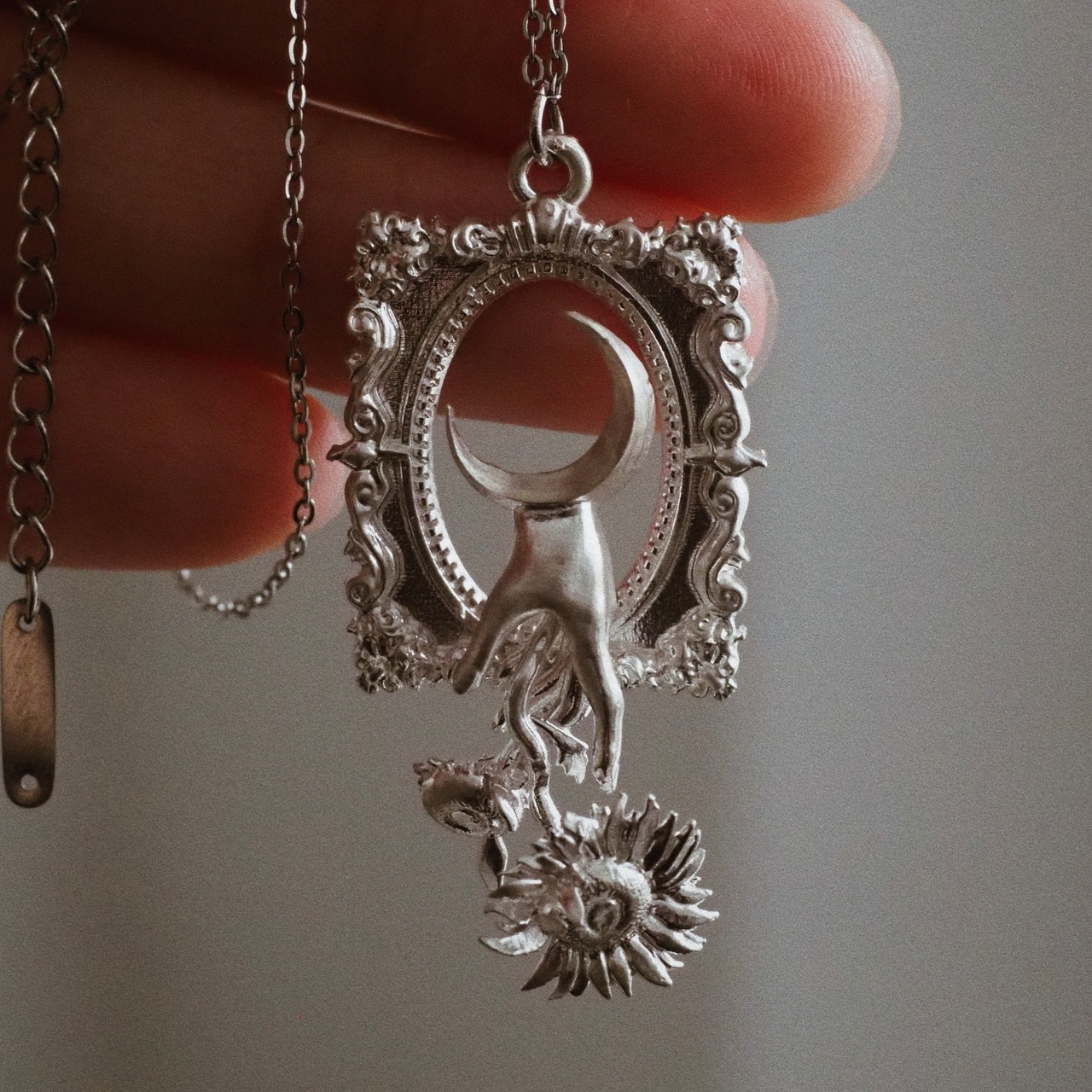 Silver necklace of sunflower that loved the moon