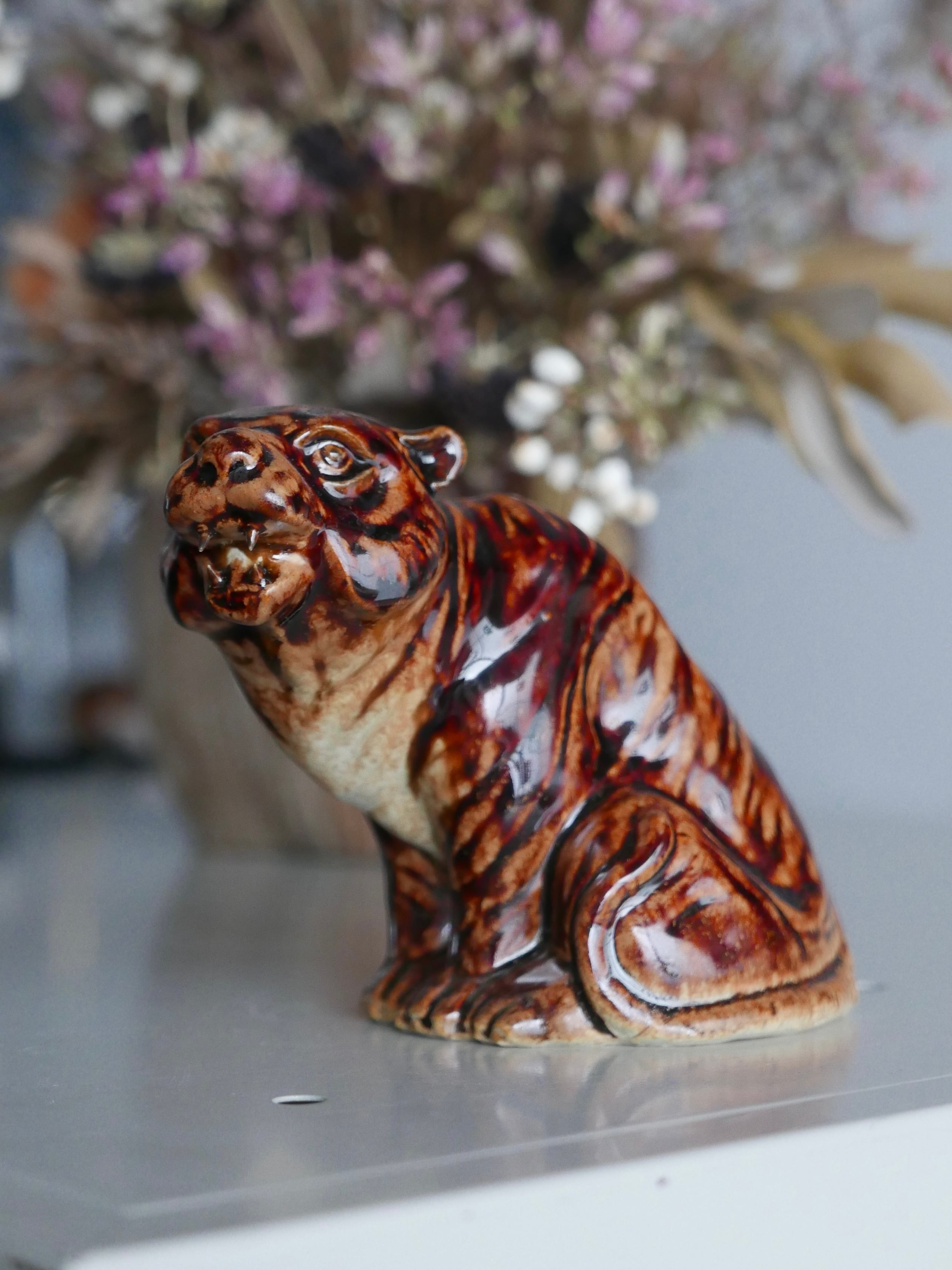pottery tiger , caramel brown