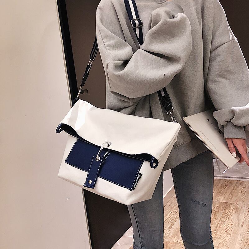 ビッグバッグフィメール2020ニューウェーブファッションヒットカラー大容量シングルショルダートートバッグキャンバスワイルドメッセンジャーバッグ Tiancai_Wing_Bag6569356