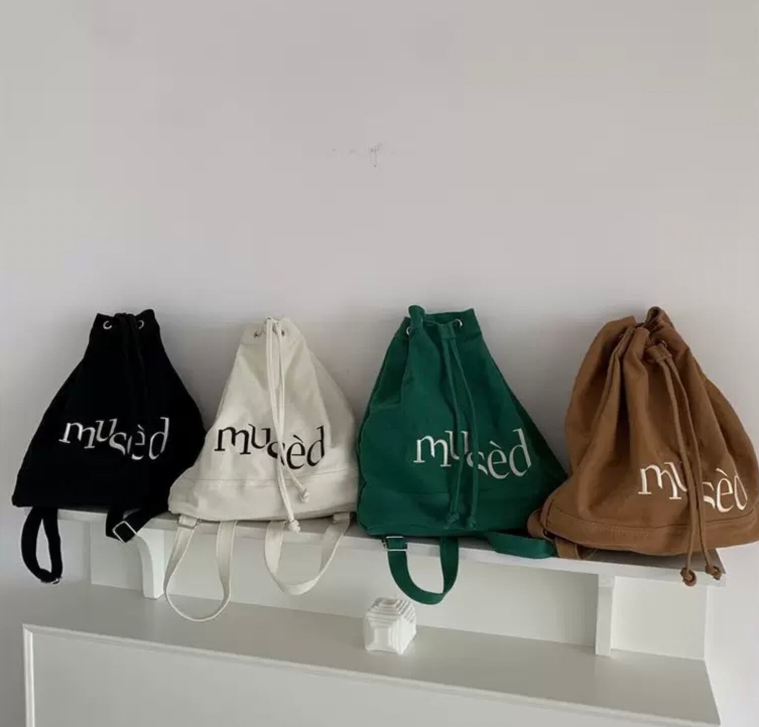 かわいい巾着型 キャンバス リュックサック ナップサック ロゴ 帆布素材 布素材 カジュアル レトロ ナチュラル Lamitte Deco トレンド 韓国ファッション ショップ Base店