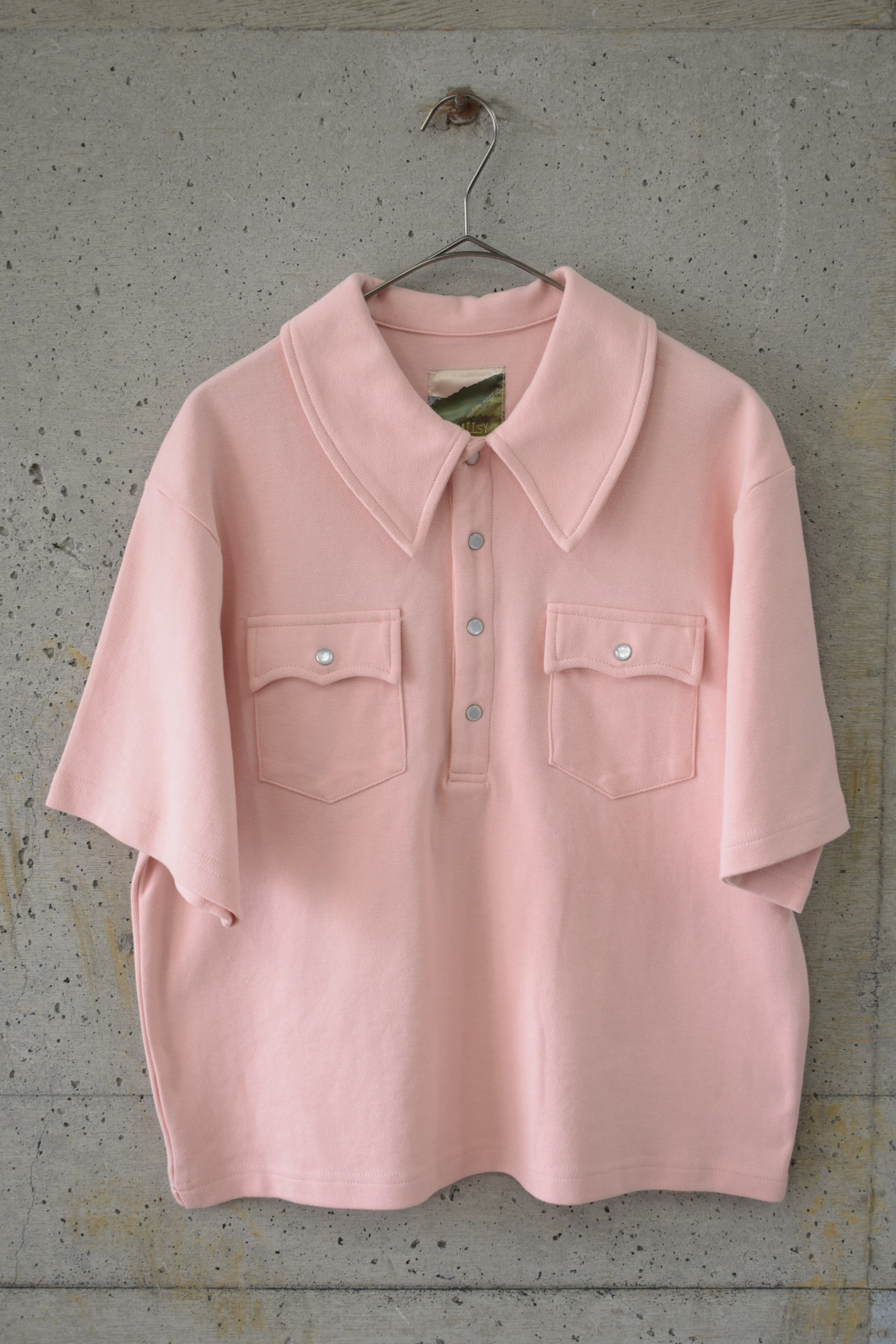 Baby pink polo shirt