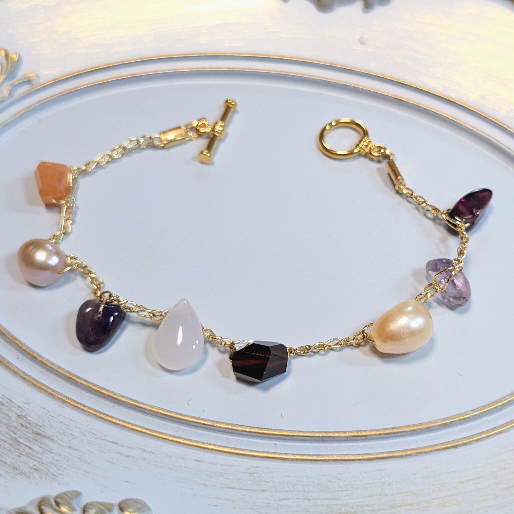 黒と金のソウタシエの耳飾り | slothtone