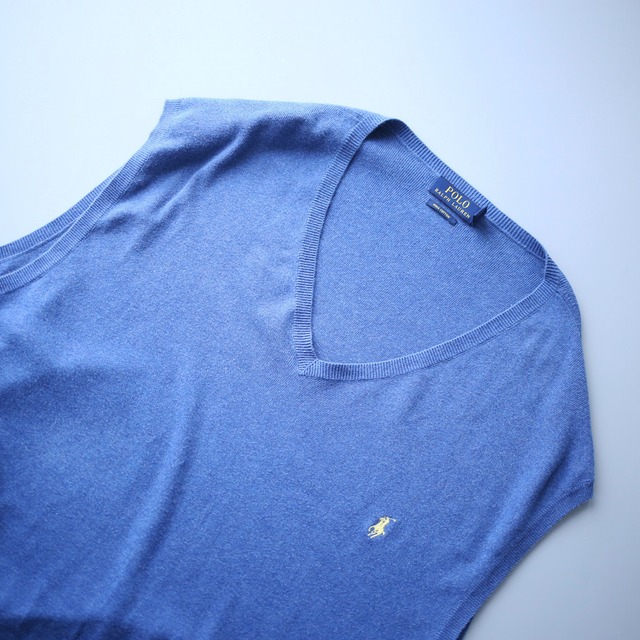 "Polo by Ralph Lauren" over silhouette blue knit vest