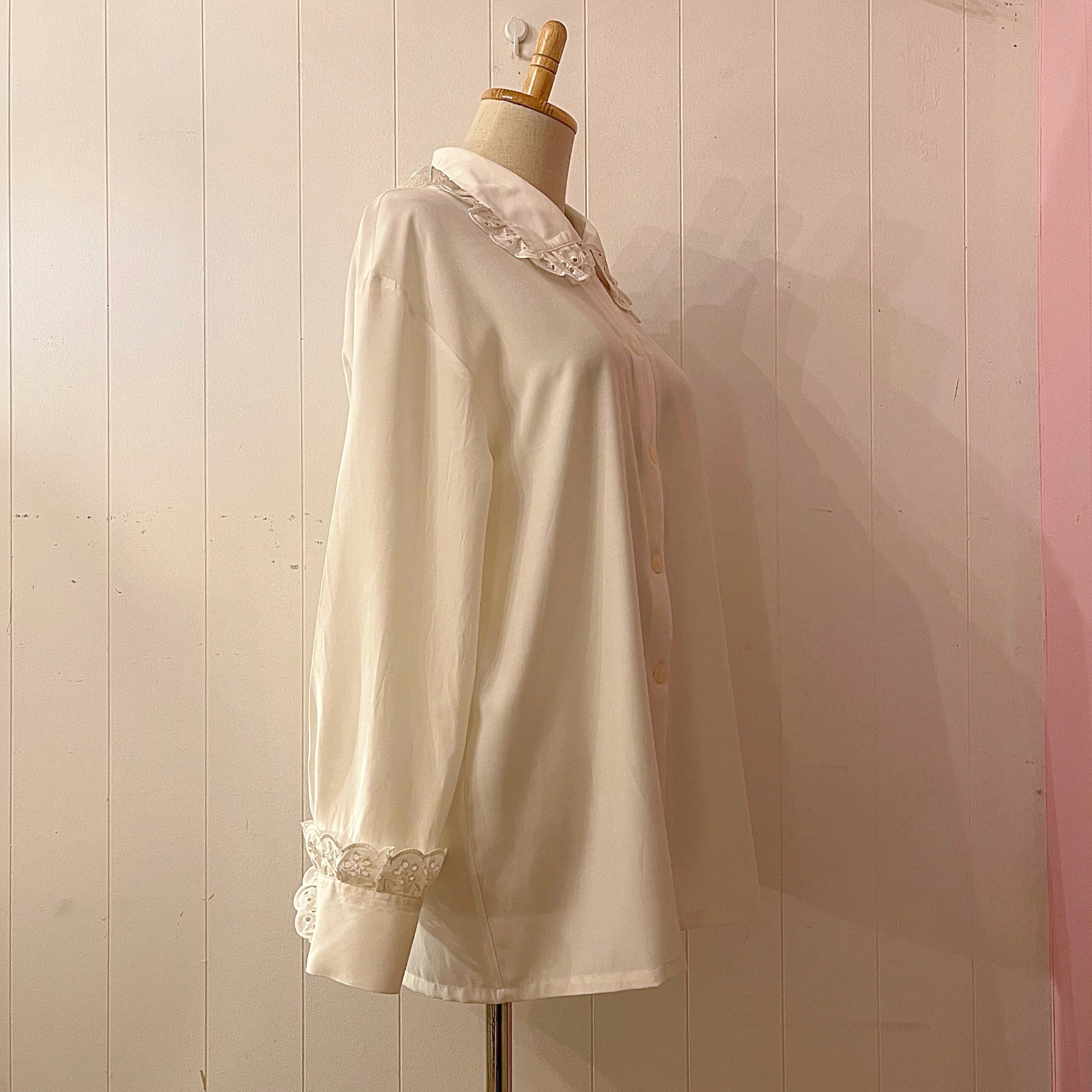 big frill cuffs white blouse