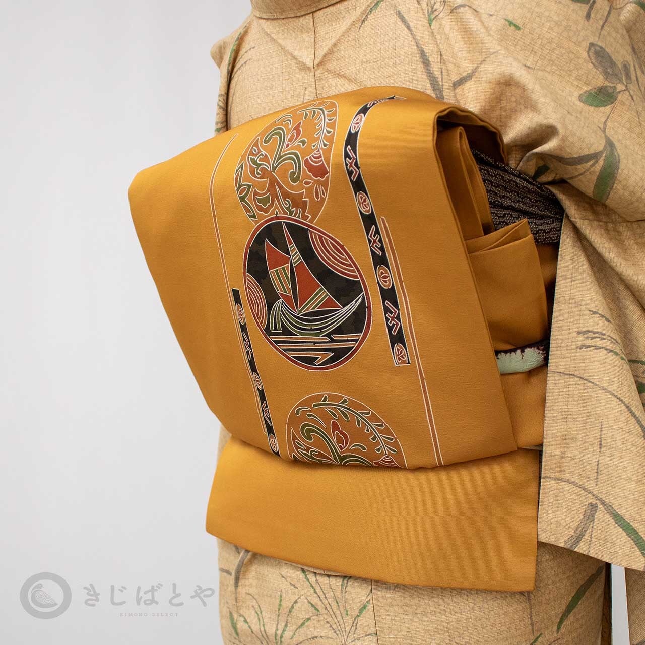 正絹塩瀬 金茶に丸紋の開きなごや