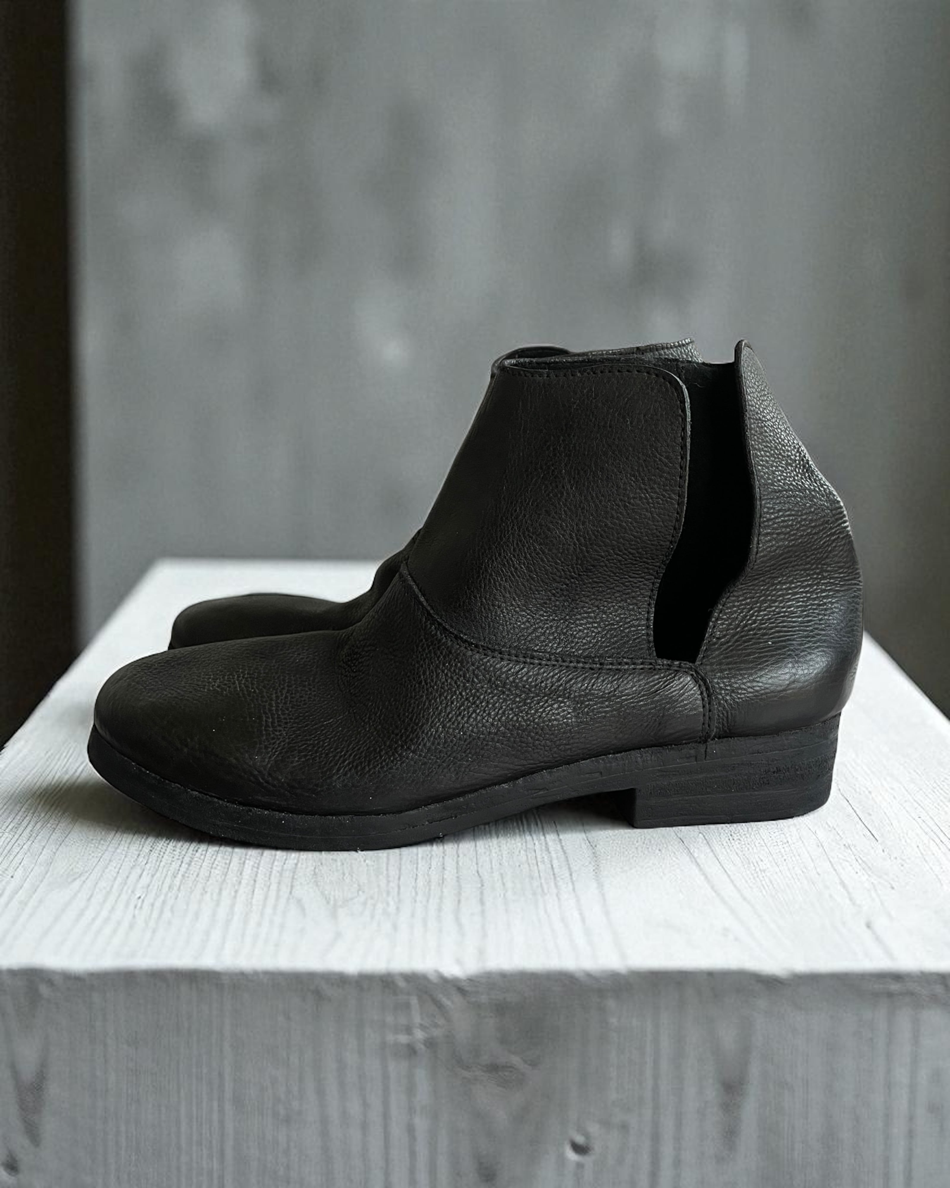 Nutsa Modebadze - Textured Leather Open-Slit Ankle Boots