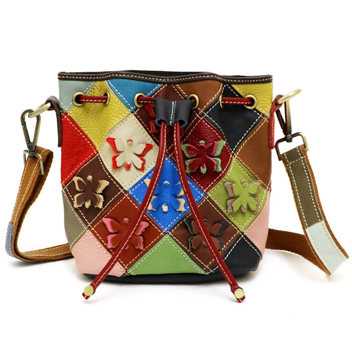 1309【ﾊﾞｯｸﾞ】Estacion～エスタシオン～・蝶々モチーフ本革巾着