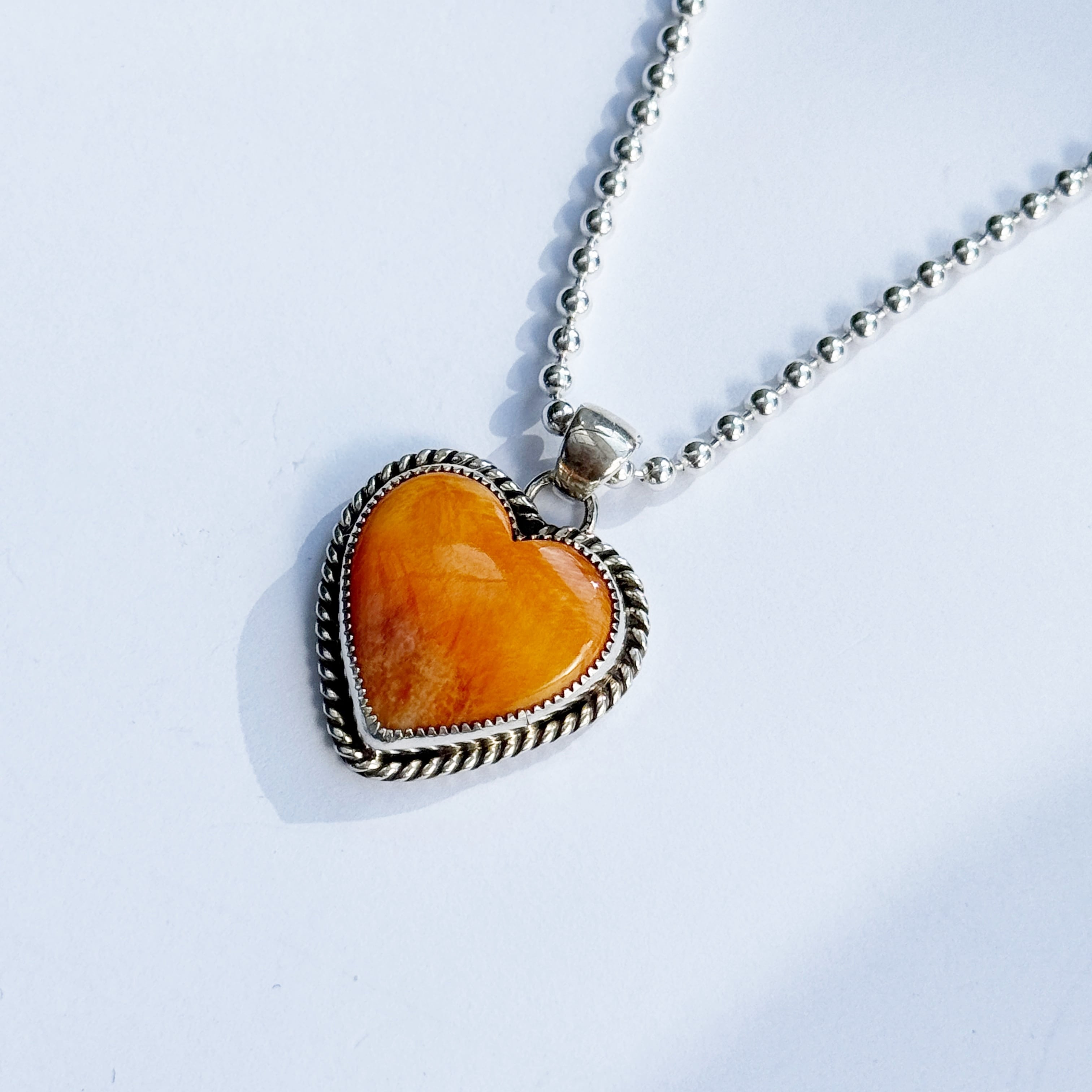   オレンジペンダントネックレス 再入荷】《Indian Jewelry 》【 一点物 】ハート スパイニー