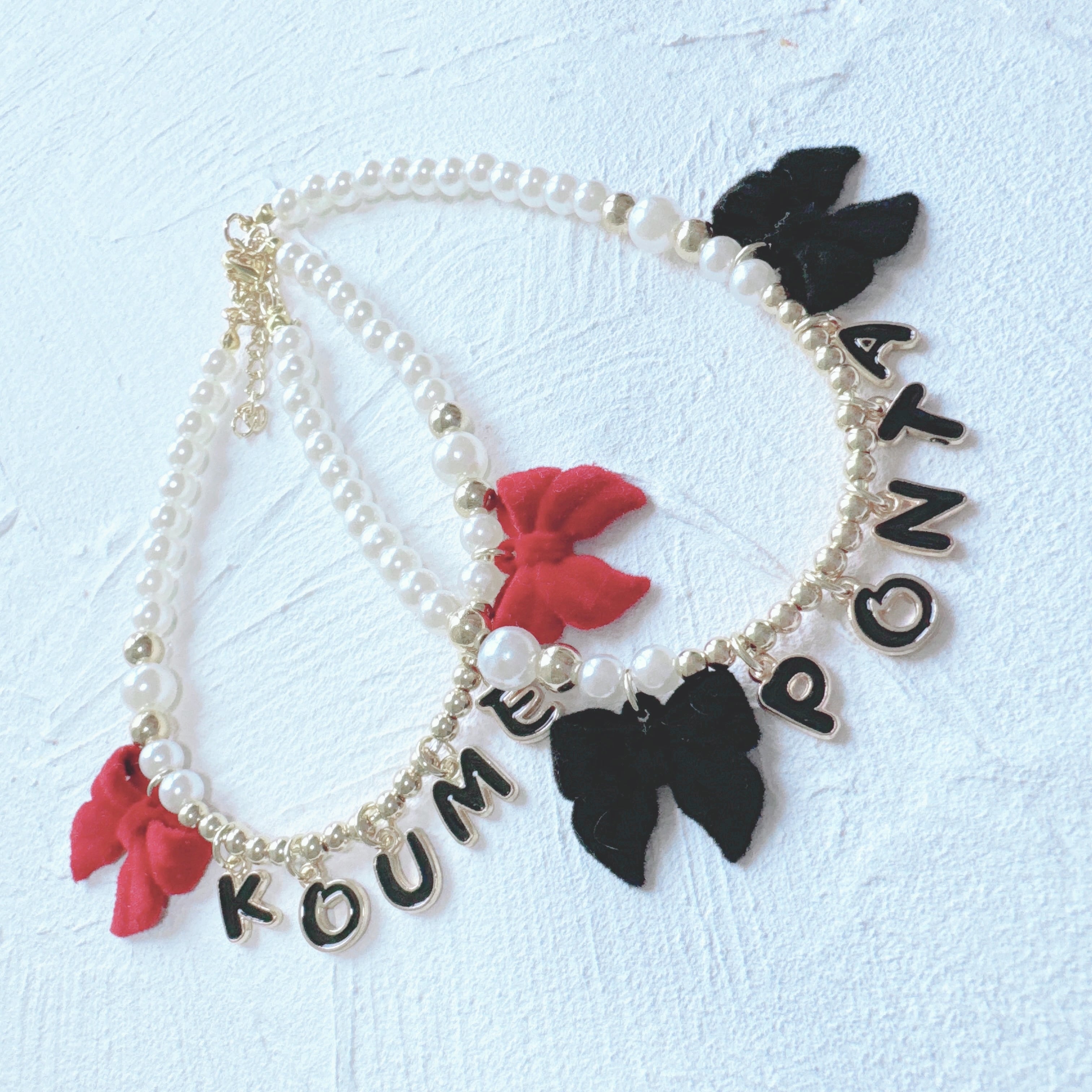 大きなリボンお名前ネックレス