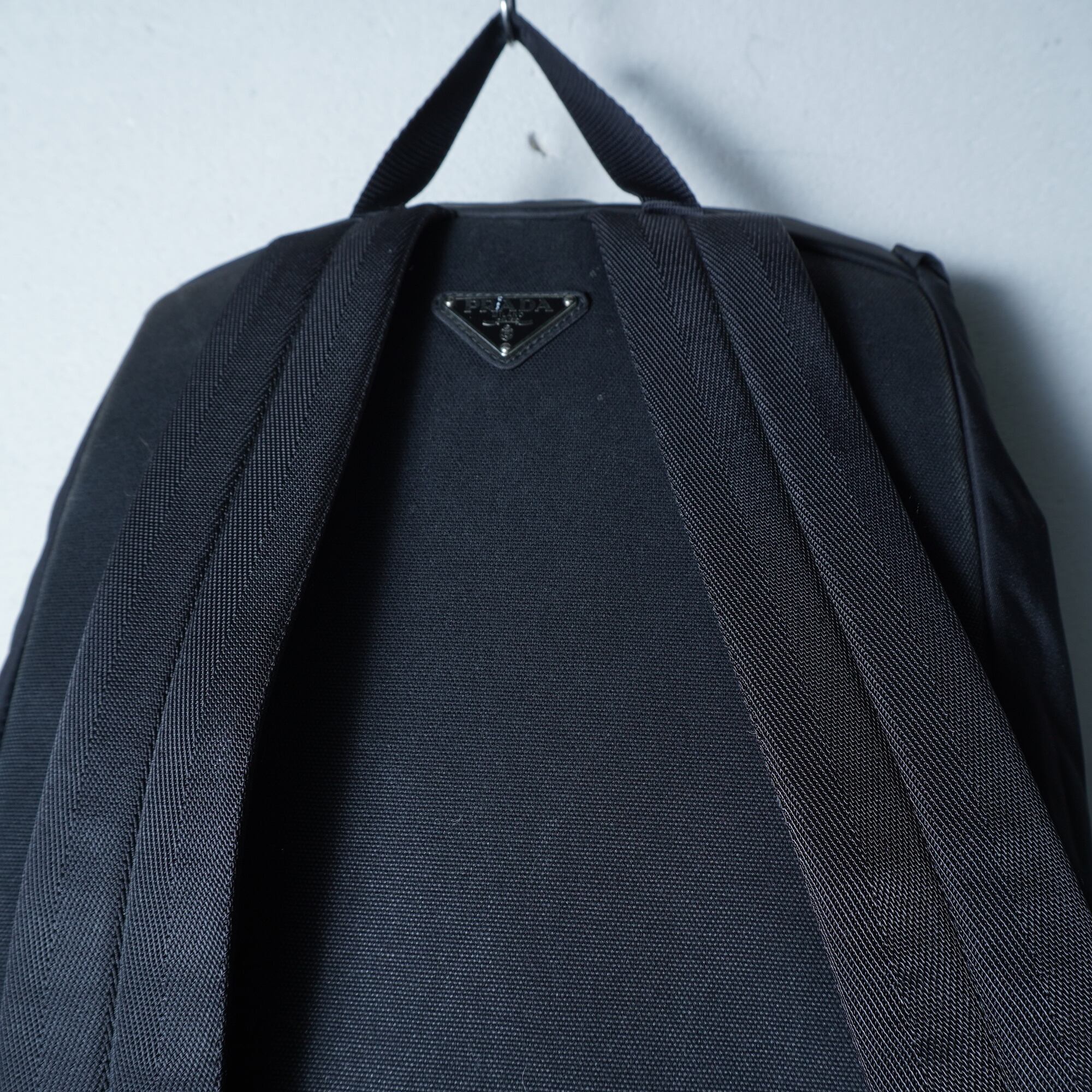 PRADA】プラダ ”V136”三角プレートロゴバックパックNERO black | MIXHIVE