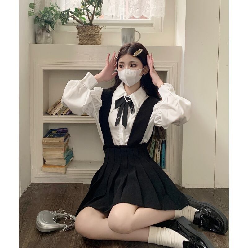 小さなプリーツサスペンダースカートのバージョンの女性の春の 小さなプリーツサスペンダースカートのバージョンの女性の春の