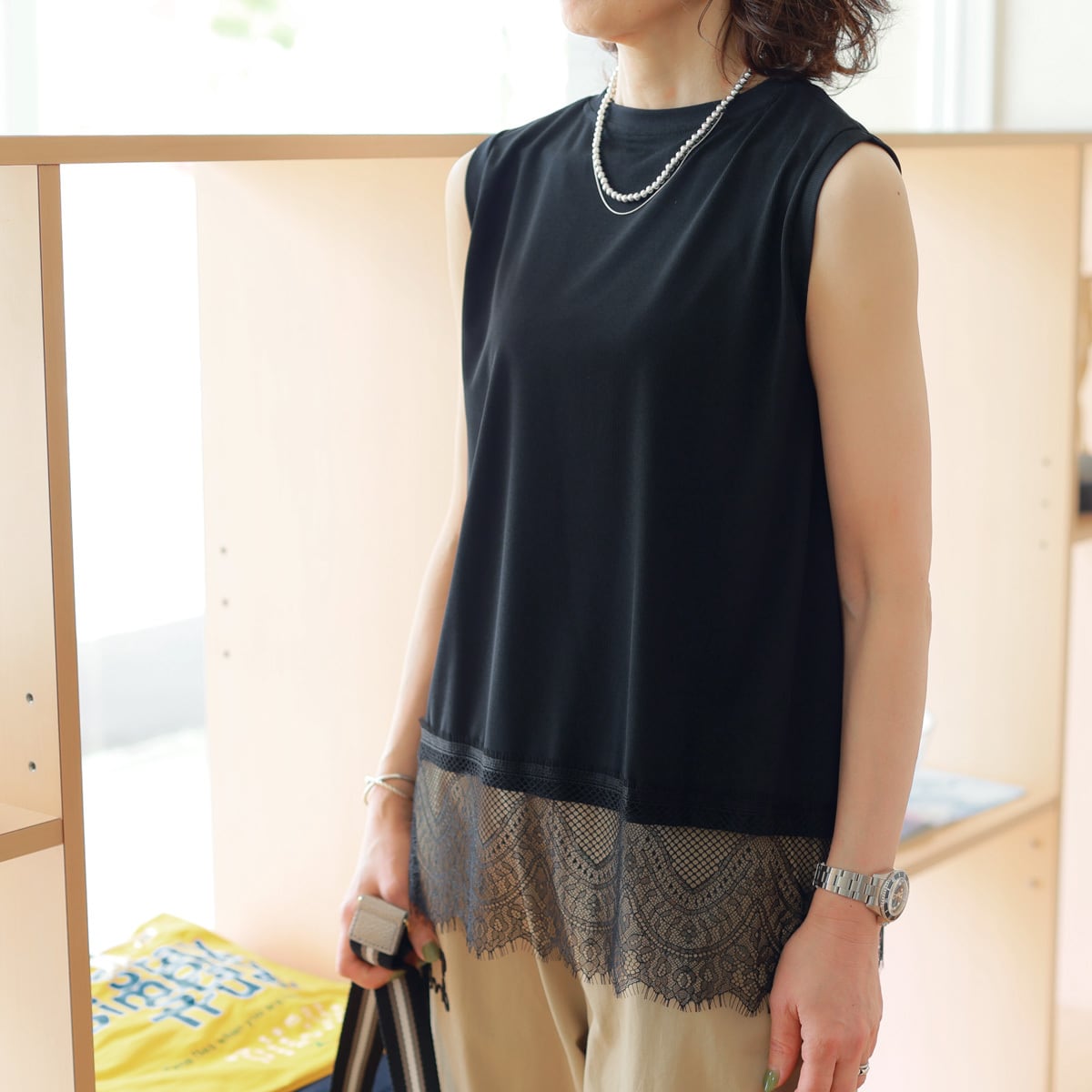 TOLNERA (トルネラ) レースヘム スリーブレス カットソー