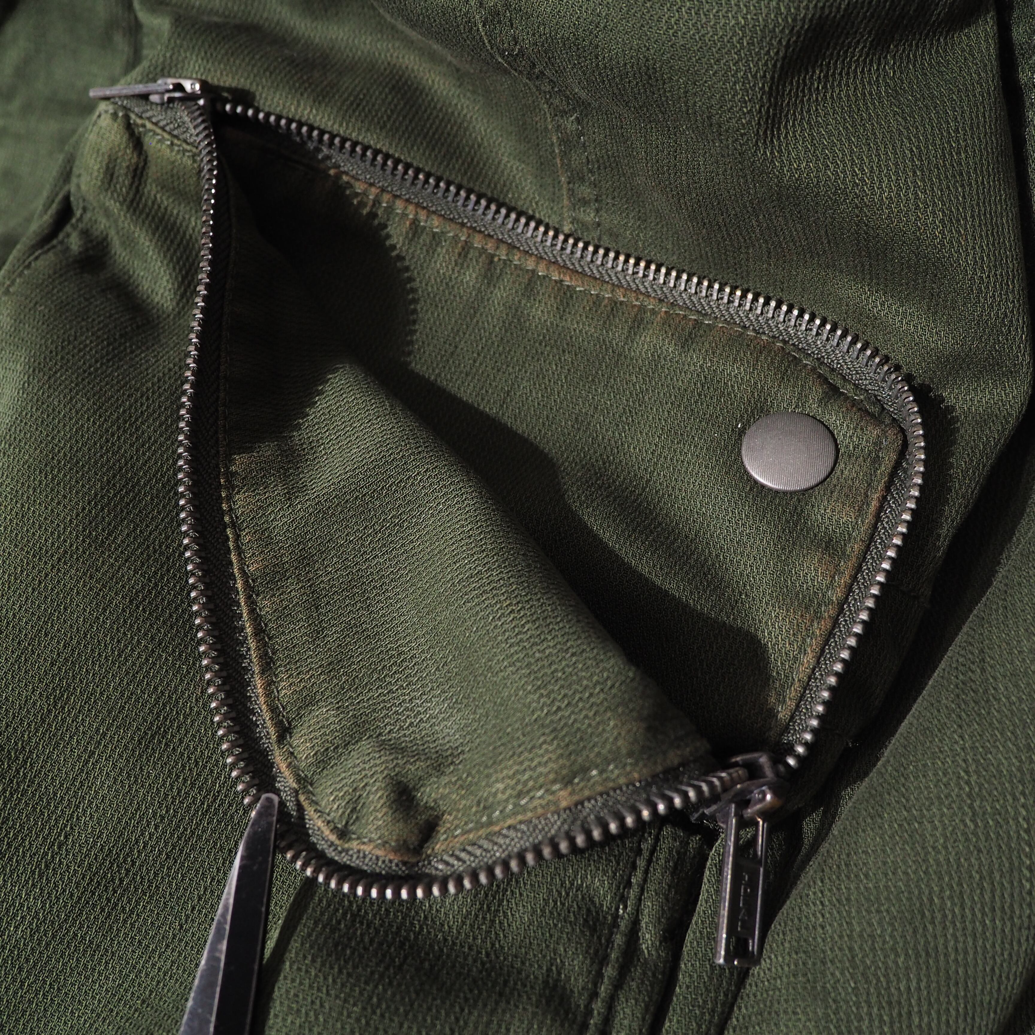 " DIESEL " Big Pockets × Switching nylon High neck Military jacket