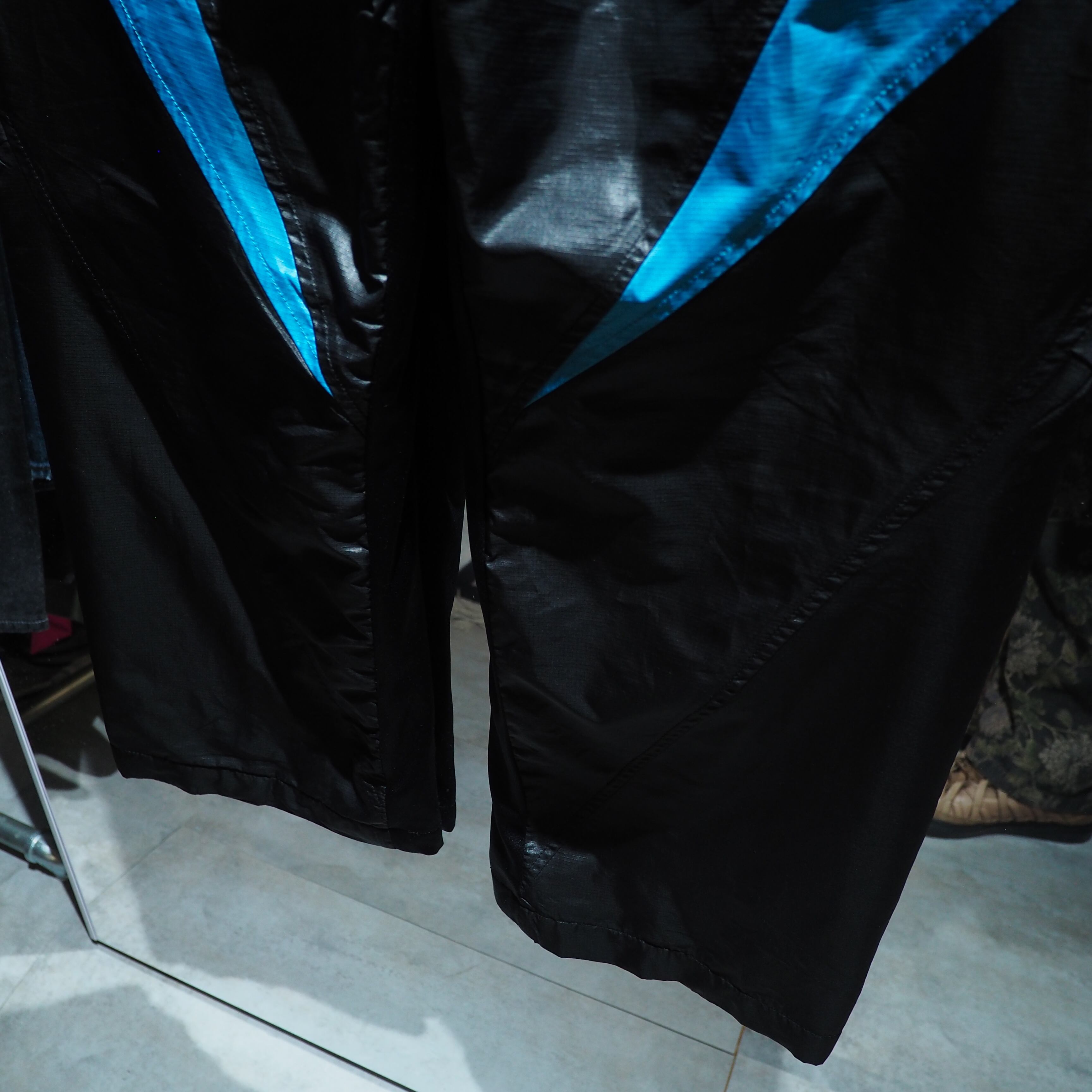 Dark Pink × Neon Blue color panel Switching Cyber track pants