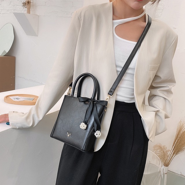 ネットレッドレトロスモールバッグ女性バッグ2020新しいトレンディファッションオールマッチワンショルダーメッセンジャーバッグポータブルトートバケットバッグ Tiancai_Wing_Bag30671705247