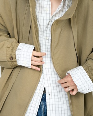 HED MAYNER "HIGH NECK ZIP UP BLOUSON 〔KHAKI〕"