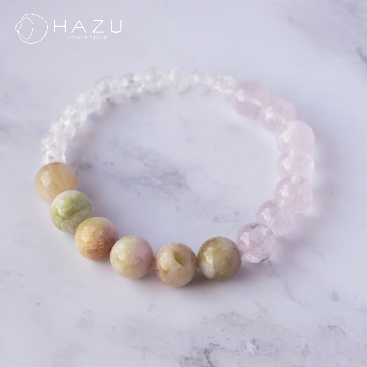 重なり合う花咲くブレス［ウォーターメロントルマリン／ローズクォーツ／クラック水晶］