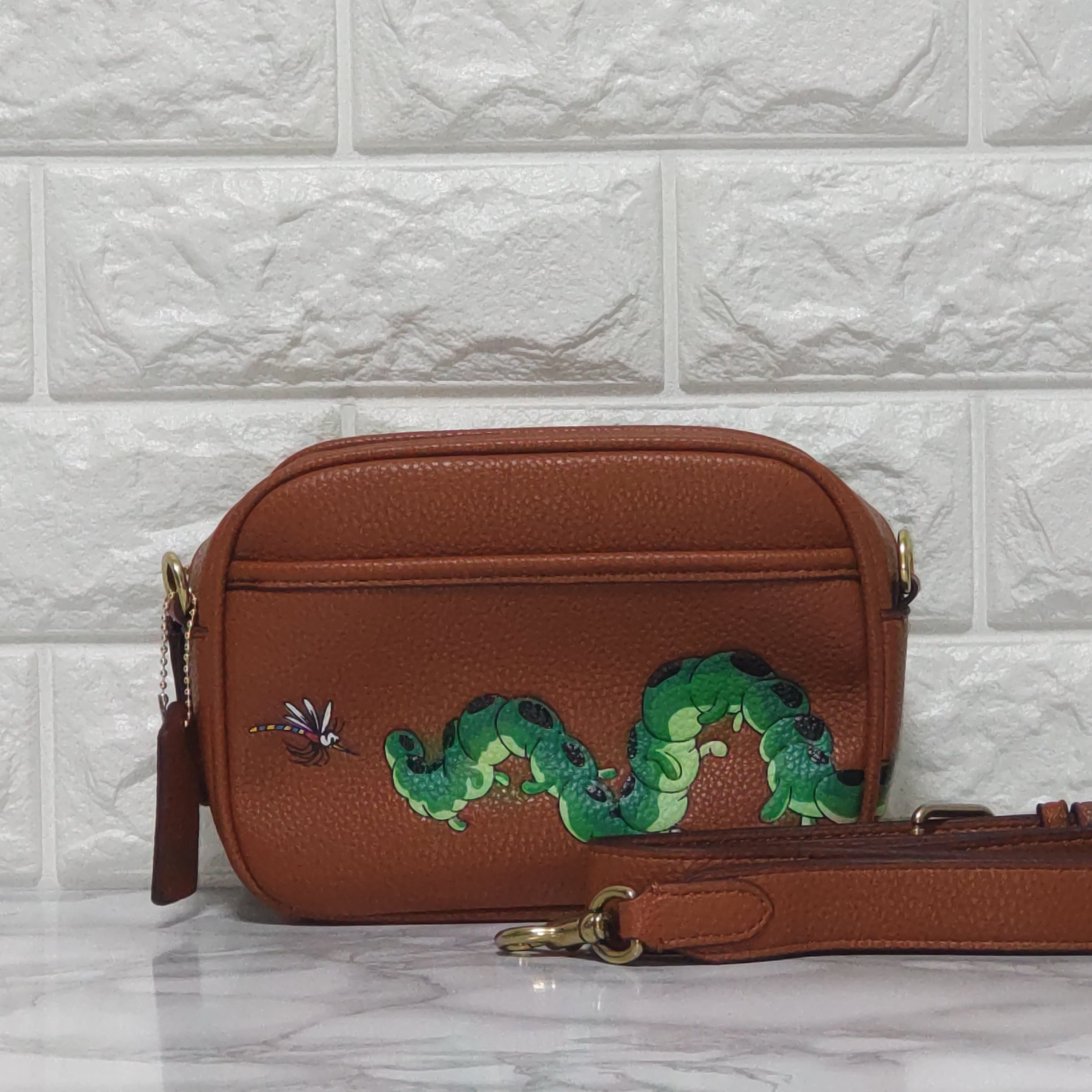 新品DISNEY X COACHフライト バッグ 19・リジェネラティブ レザー