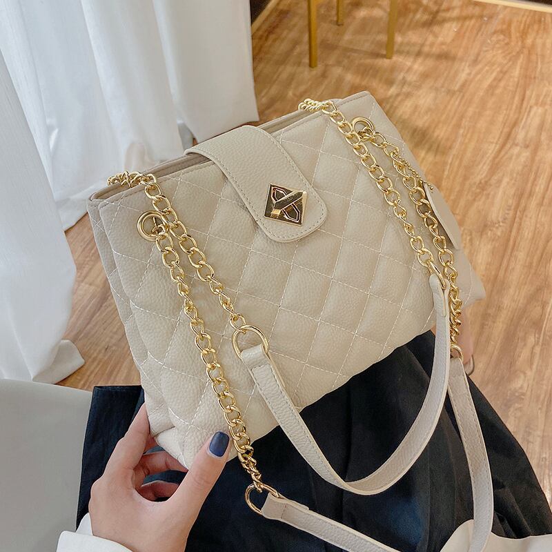 小さなバッグの女性バッグ2020新しい波ネット赤いファッションダイヤモンドチェーンショルダーメッセンジャーバッグワイルドバケットバッグのバージョン Tiancai_Wing_Bag6685675