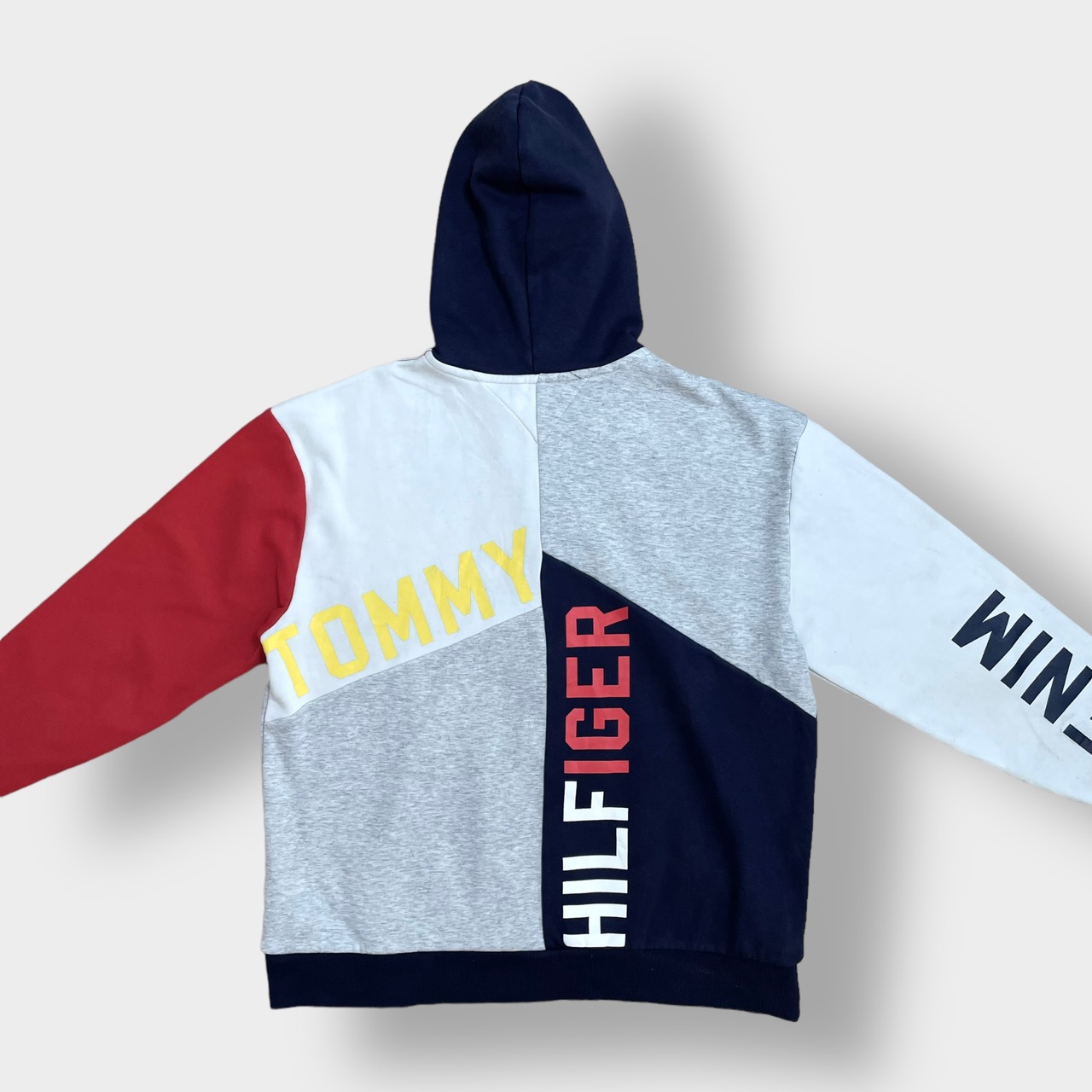 TOMMY HILFIGER DENIM ジップアップ パーカー クレイジーパターン フーディー スウェット プリント 袖ロゴ 切替 刺繍ロゴ L マルチカラー トミーヒルフィガー  US古着