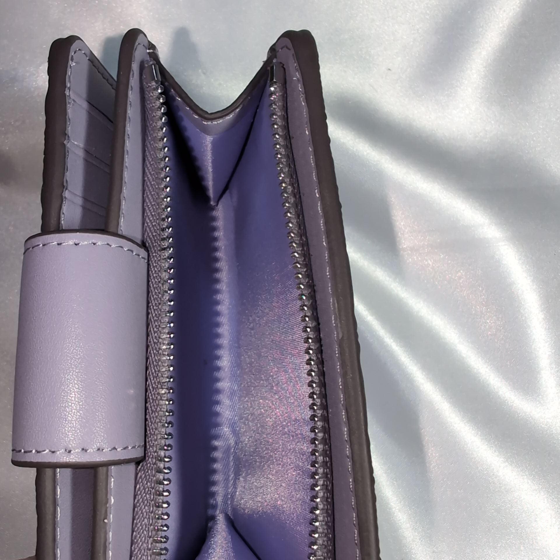 COACHコーチ 二つ折り財布 シグネチャーエンボス パープル | francore