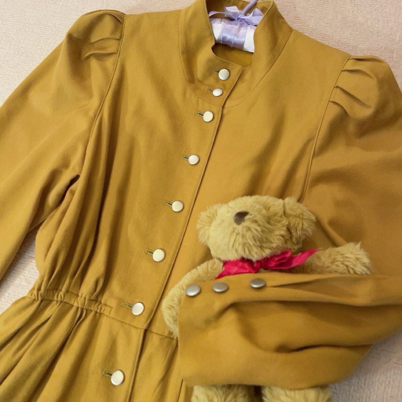 mustard front metal button one-piece