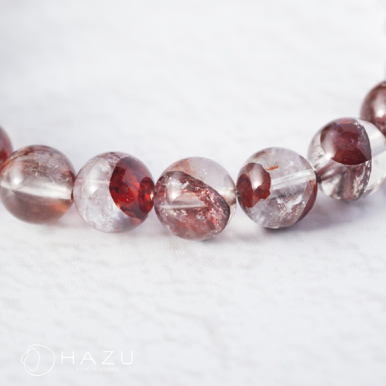 天眼模様／成功と幸運を呼ぶ赤い雫［ライモナイトインクォーツ／水晶］